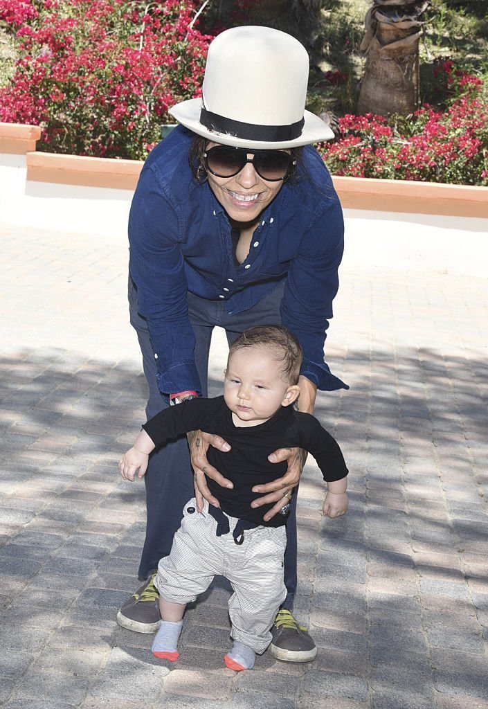 Linda Perry and son Rhodes Emilio Gilbert Perry attend Peak Mind Foundation Hosts A Talk With His Holiness The 14th Dalai Lama  | Getty Images