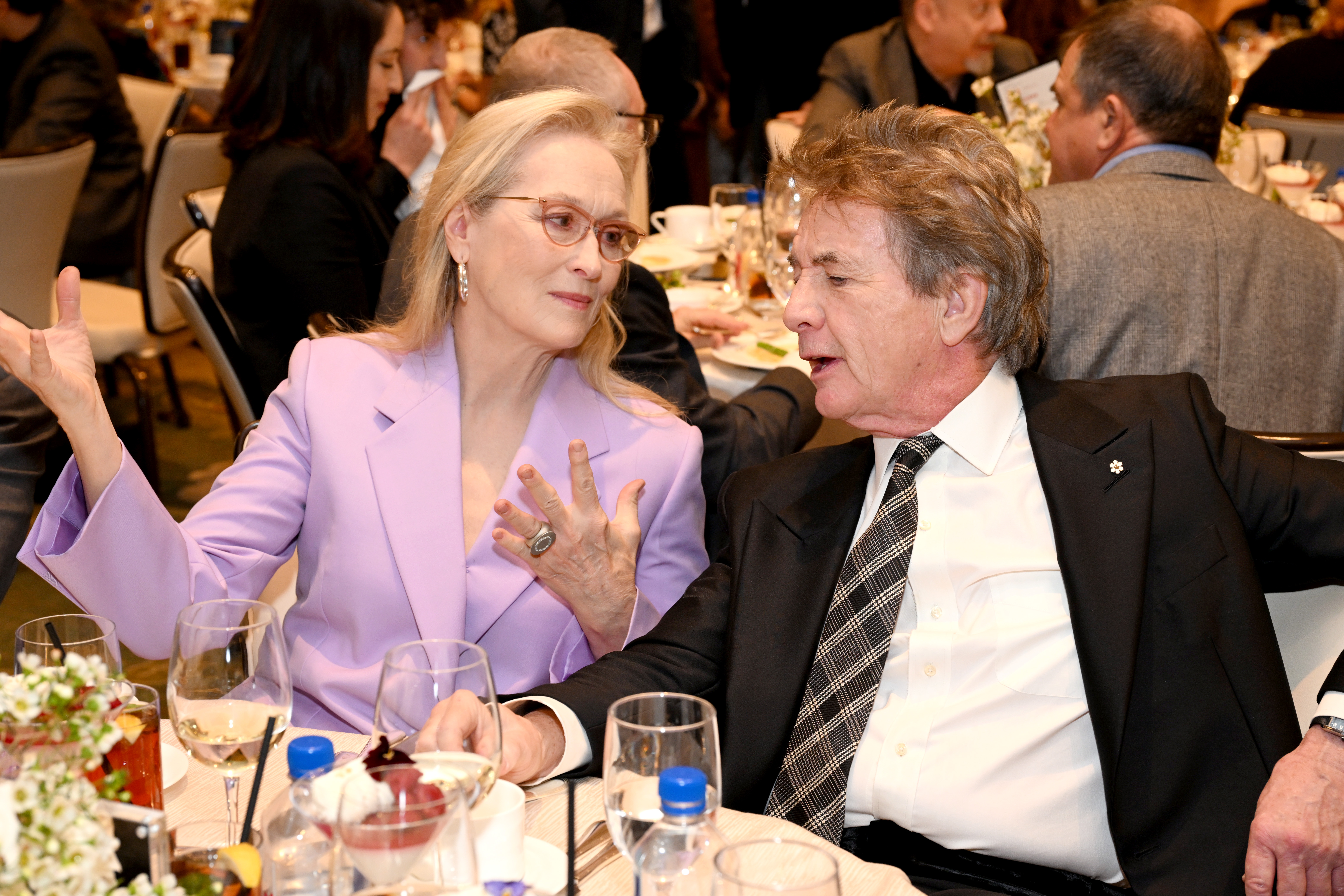 Meryl Streep and Martin Short with FIJI Water at The AFI Awards Luncheon at Four Seasons Hotel Los Angeles at Beverly Hills in Los Angeles, California, on January 12, 2024. | Source: Getty Images