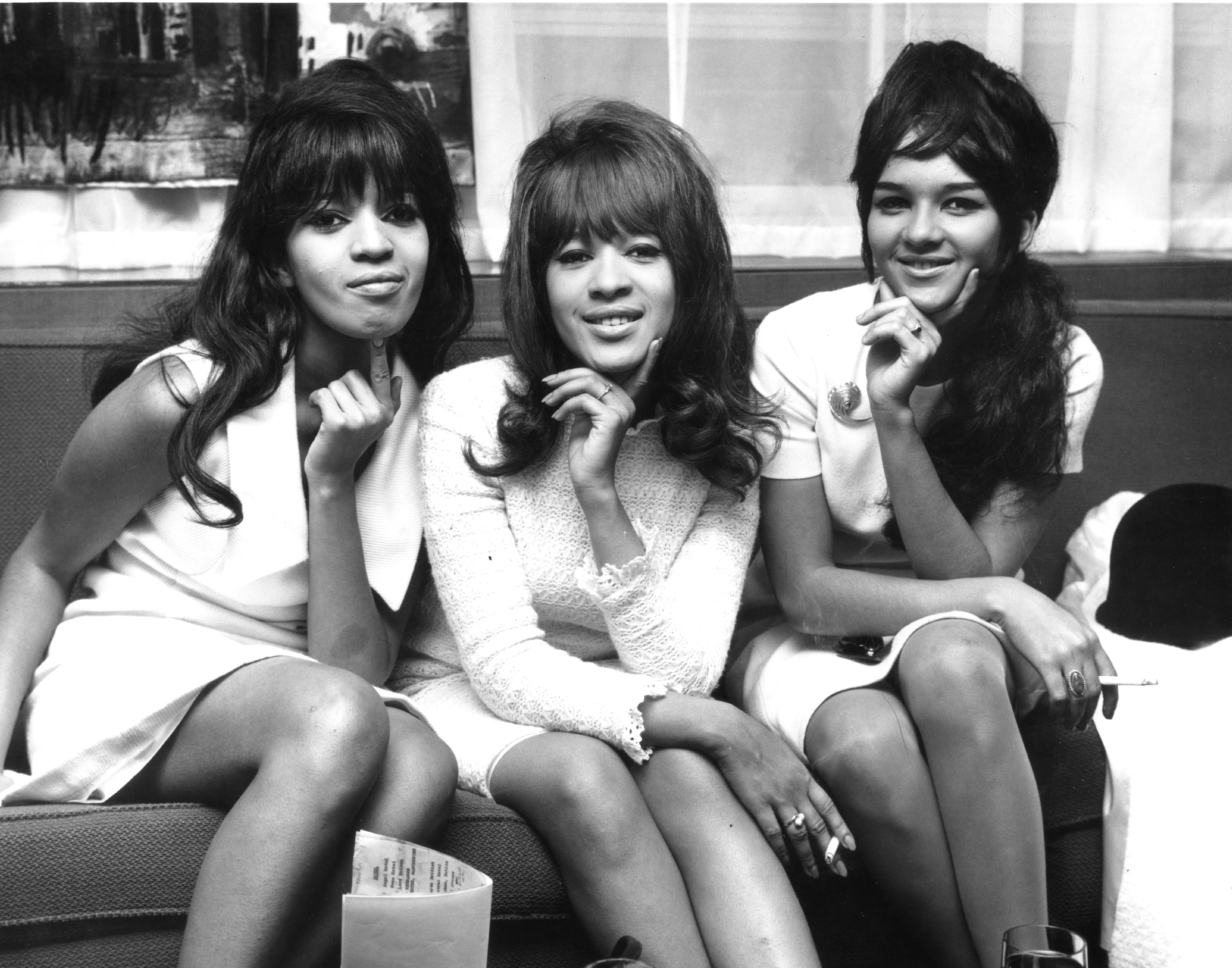 Estelle Bennett Vann, Ronnie Spector, and Nedra Talley Ross of the vocal trio "Ronettes" pose for a portrait in circa 1964 | Source: Getty Images