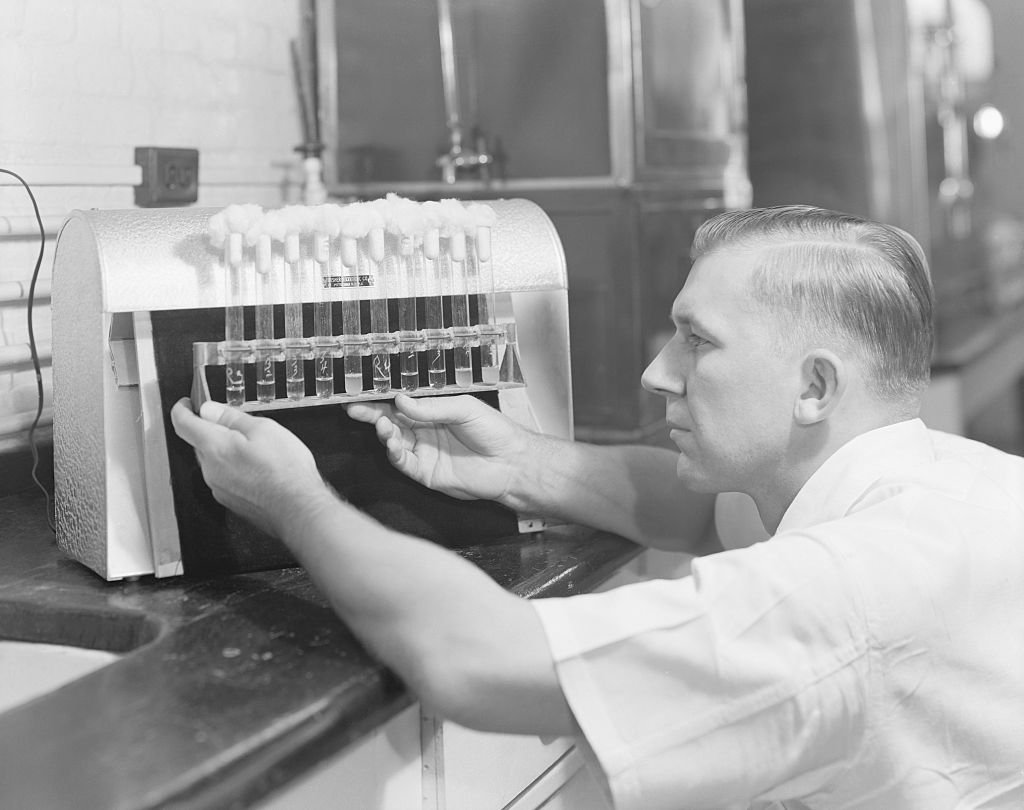 Penicillin manufacturer at Charles Pfizer factory testing cultures | Source: Getty Images