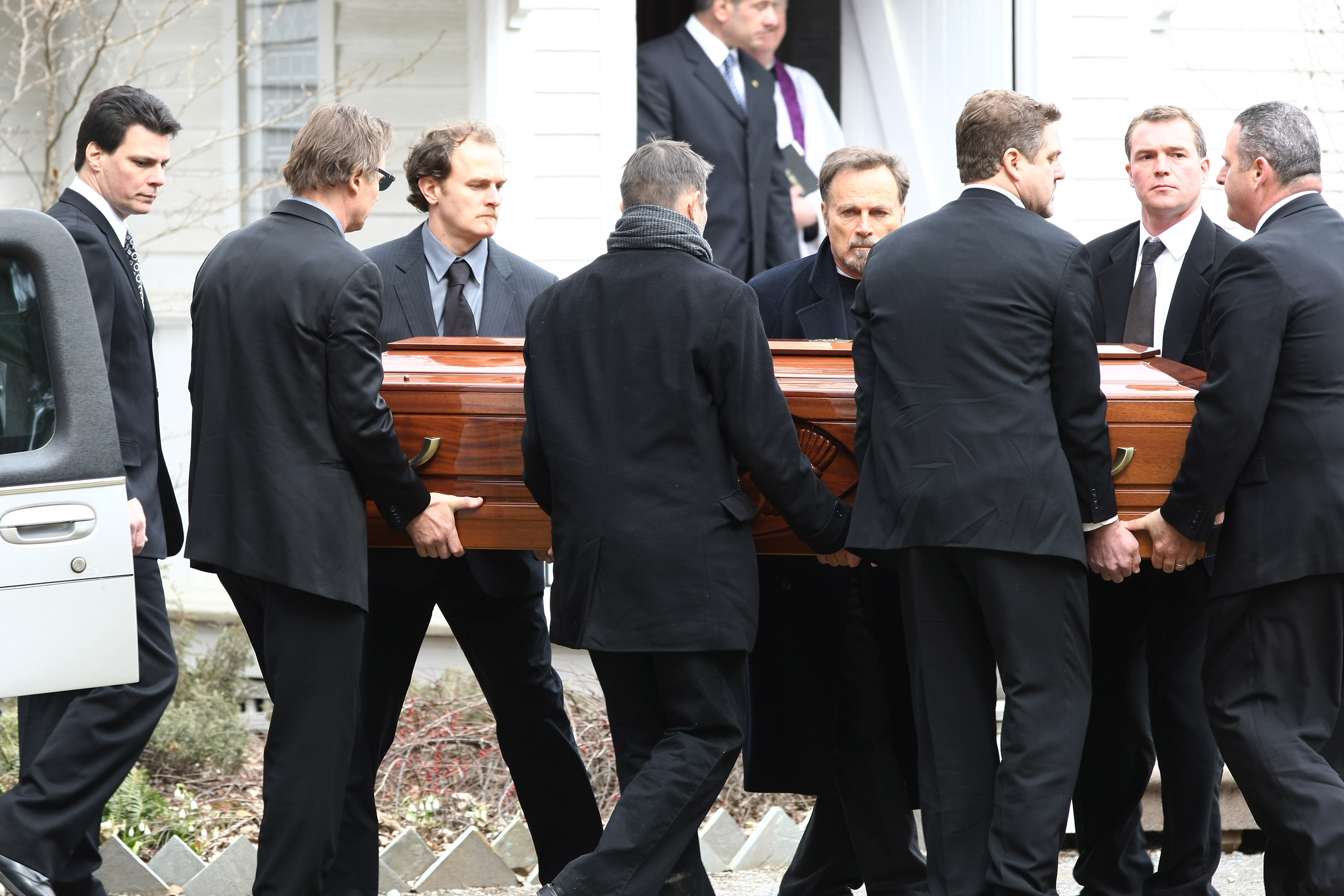 Liam Neeson serves as a pallbearer during Natasha Richardson’s funeral at St. Peter’s Lithgow Episcopal Church in Lithgow, New York, on March 22, 2009. He helps carry her casket alongside family and friends following her death from a skiing accident days earlier.