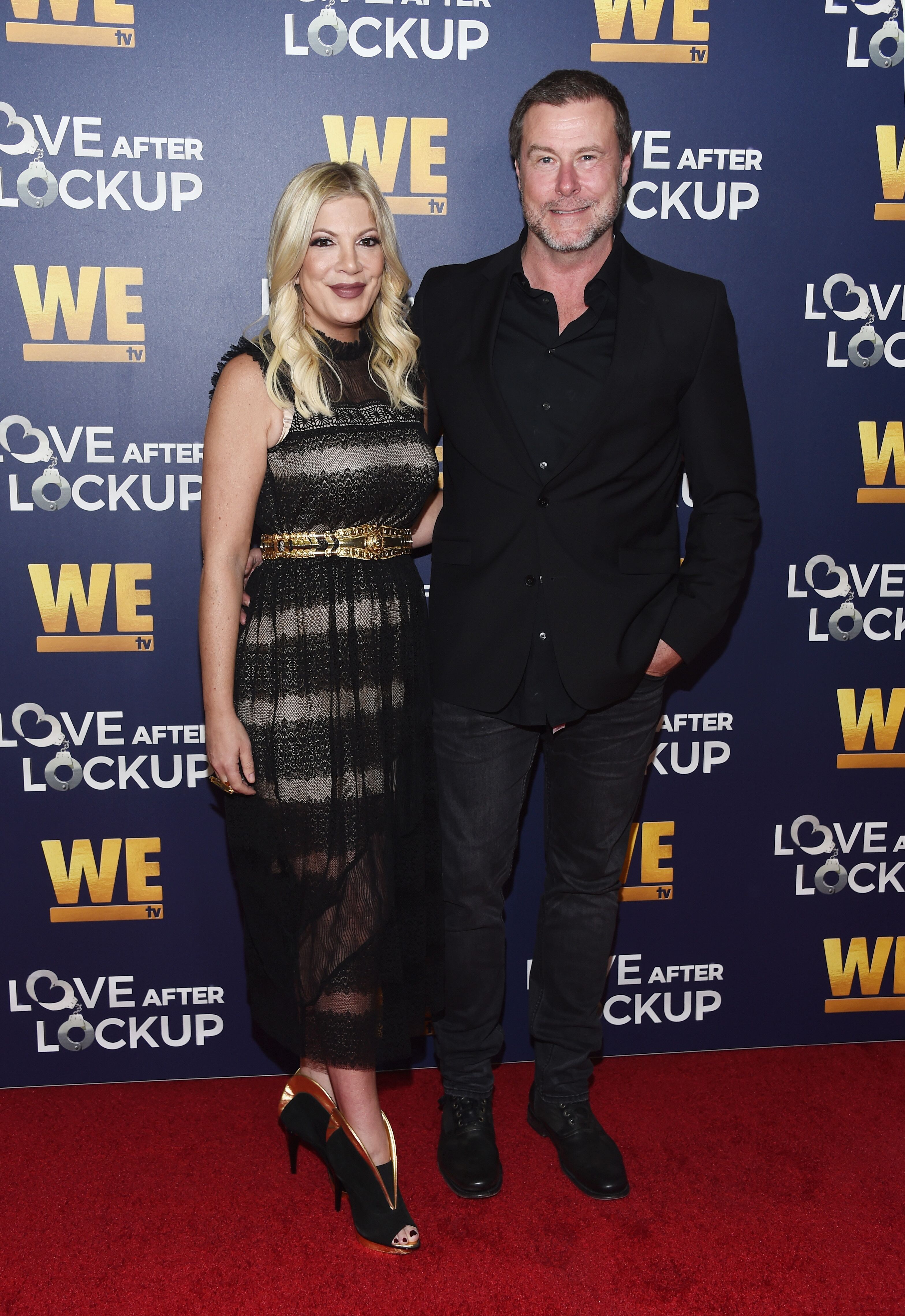 Tori Spelling and Dean McDermott arrive at WE tv's Real Love: Relationship Reality TV's Past, Present & Future event at The Paley Center for Media on December 11, 2018 | Source: Getty Images