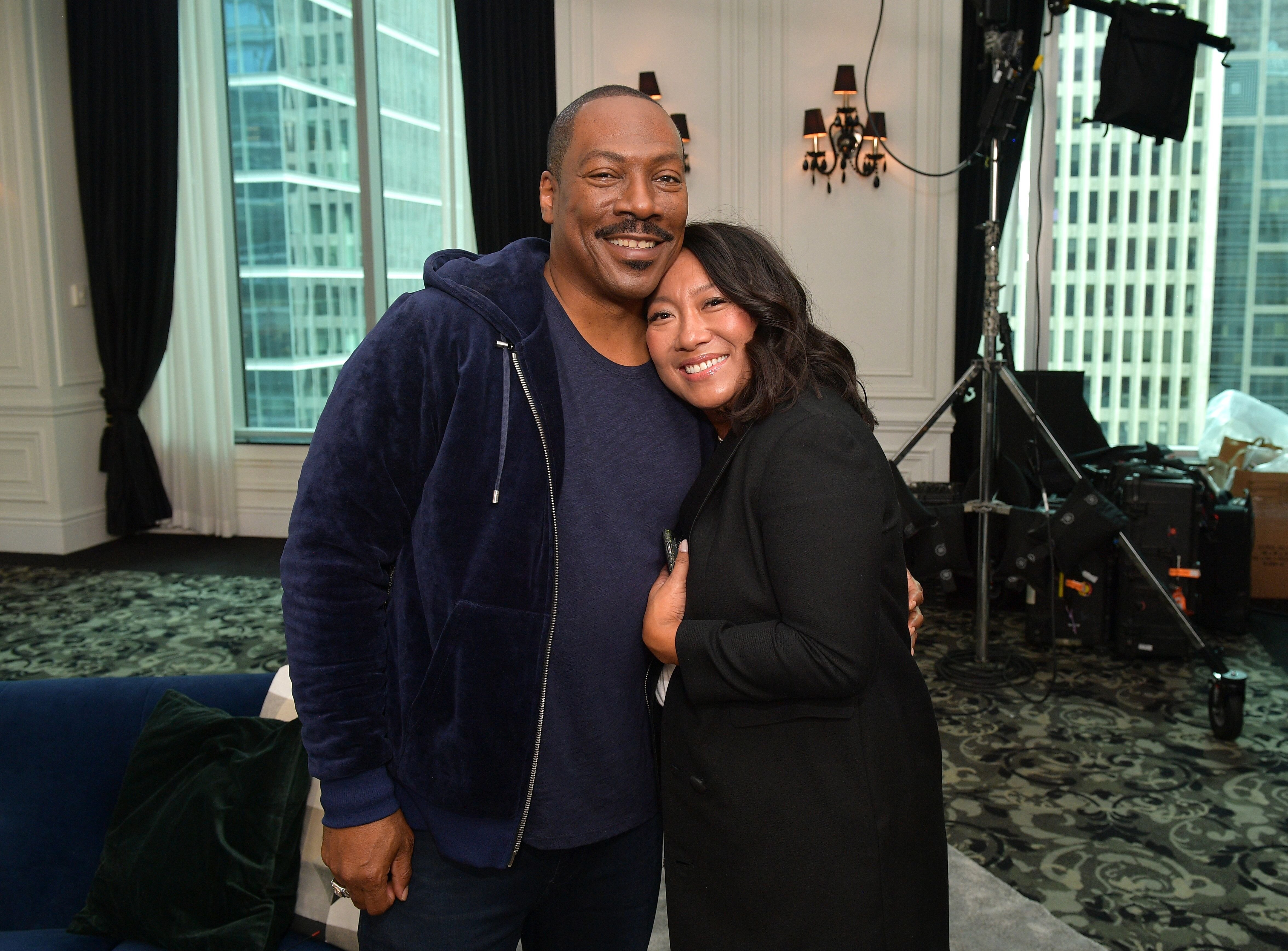 Eddie Murphy and Jasmin Reate attend The Hollywood Reporter TIFF Studio. | Source: Getty Images