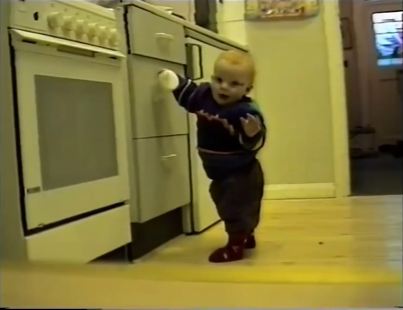 Young Ed Sheeran in his "Photograph" music video, published 10 May 2015. | Source: YouTube/Cleyver Music