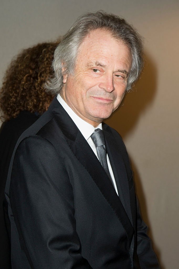 Franz-Olivier Giesbert assiste au défilé Yves Saint Laurent printemps-été 2013 dans le cadre de la Fashion Week de Paris, au Grand Palais à Paris. | Photo : Getty Images Franz-Olivier Giesbert assiste au défilé Yves Saint Laurent printemps-été 2013 dans le cadre de la Fashion Week de Paris, au Grand Palais à Paris. | Photo : Getty Images