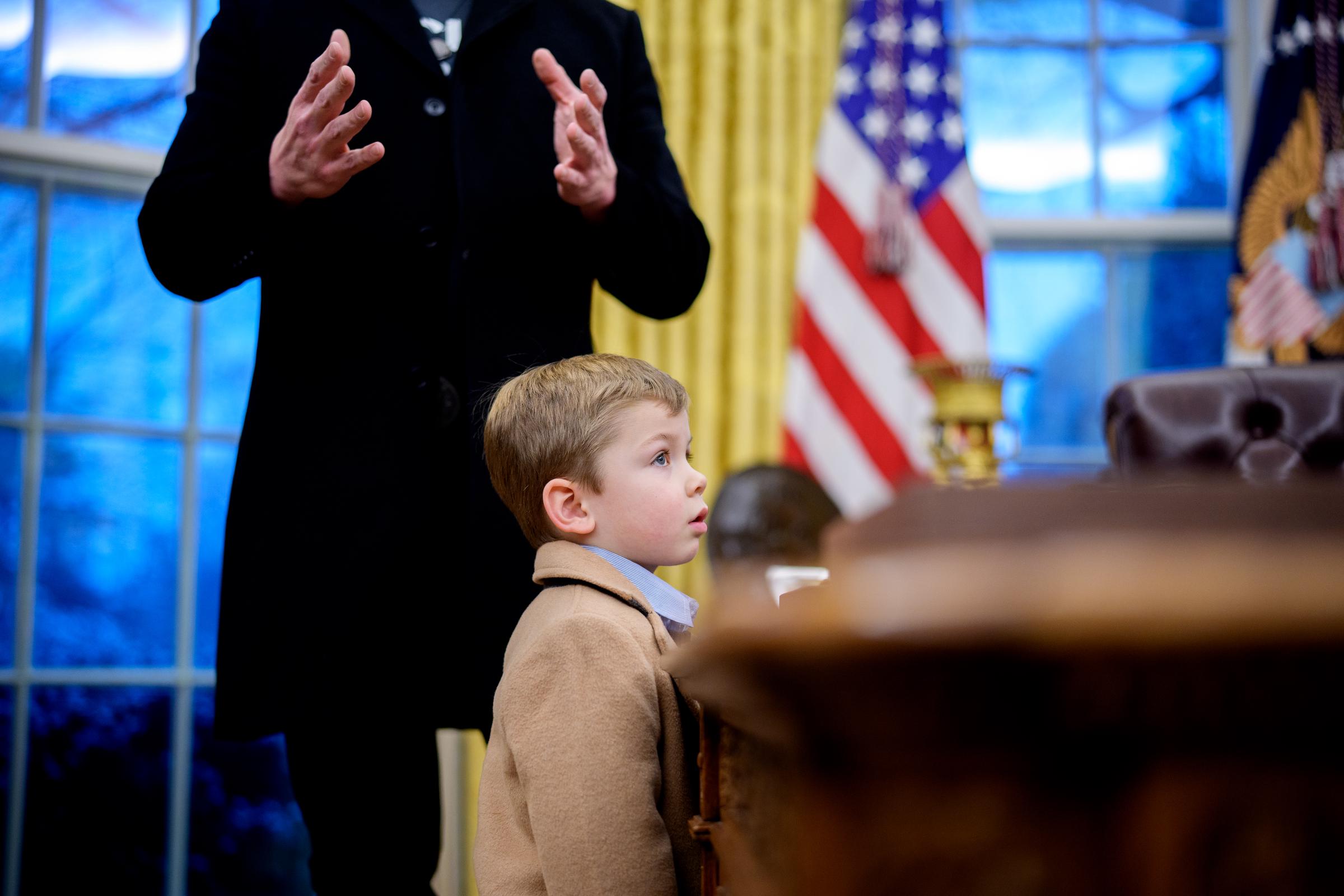 X Æ A-Xii stands in front of Elon Musk during an executive order signing in the Oval Office, on February 11, 2025 | Source: Getty images