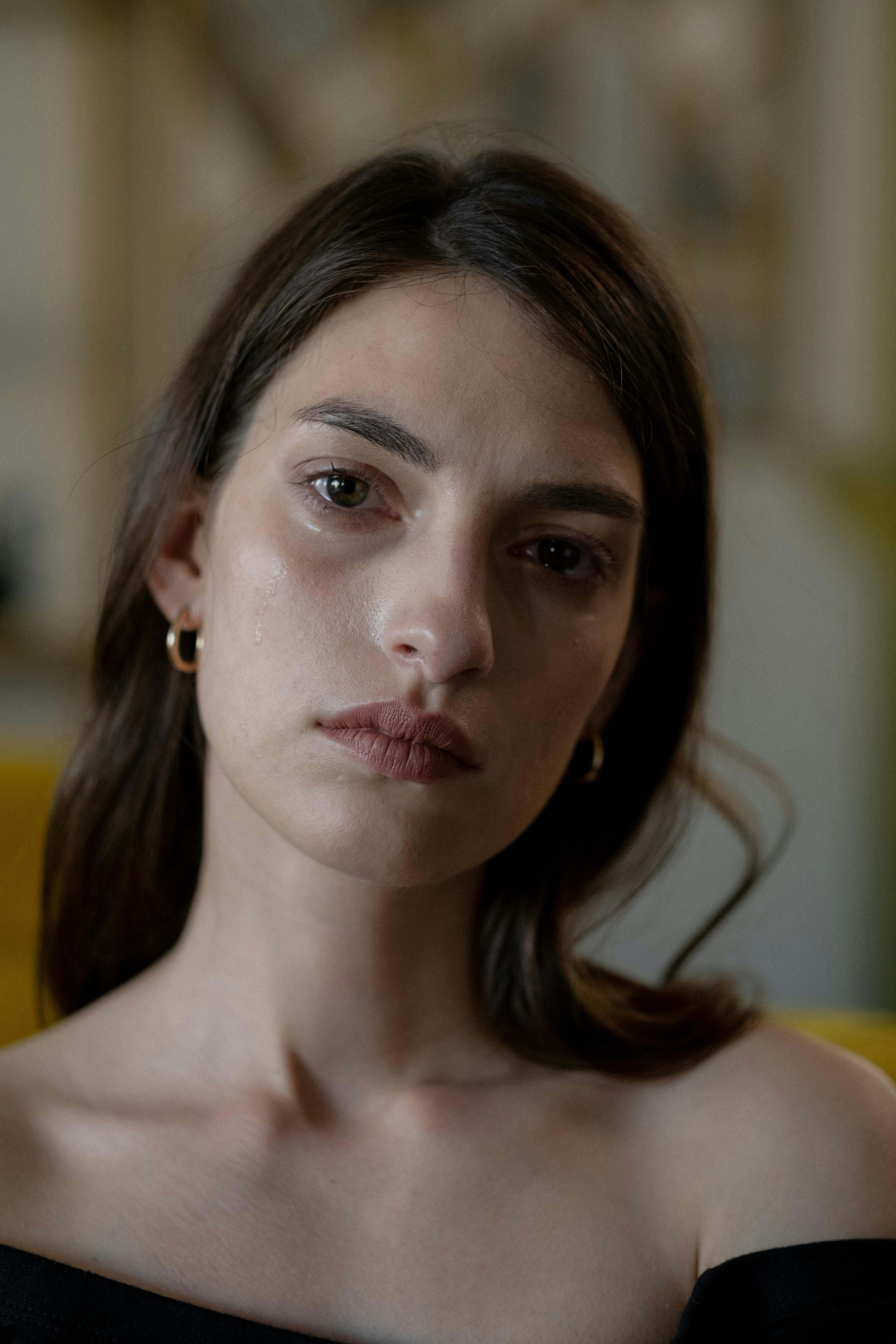 A sad and teary-eyed woman | Source: Pexels