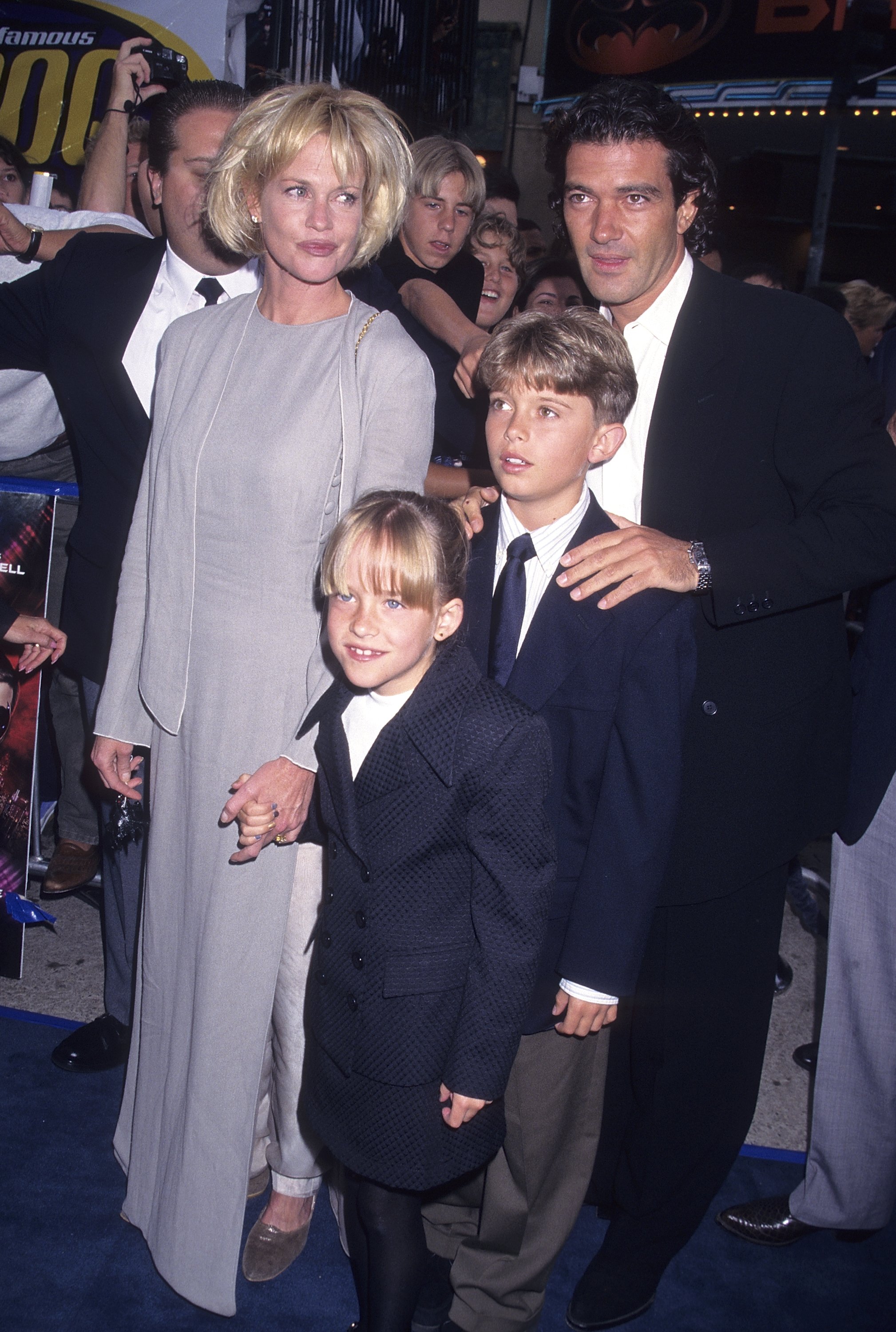 ctress Melanie Griffith, actor Antonio Banderas, Melanie's daughter Dakota Johnson and Melanie's son Alexander Bauer attend the "Batman & Robin" Westwood Premiere on June 12, 1997 at the Mann Village Theater in Westwood, California | Source: Getty Images