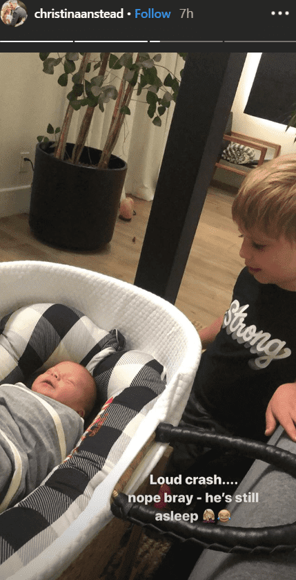 Christian Anstead shares picture of her son Hudson sleeping in a bassinet with her other son Braydon watching him | Source: instagram.com/christinaanstead
