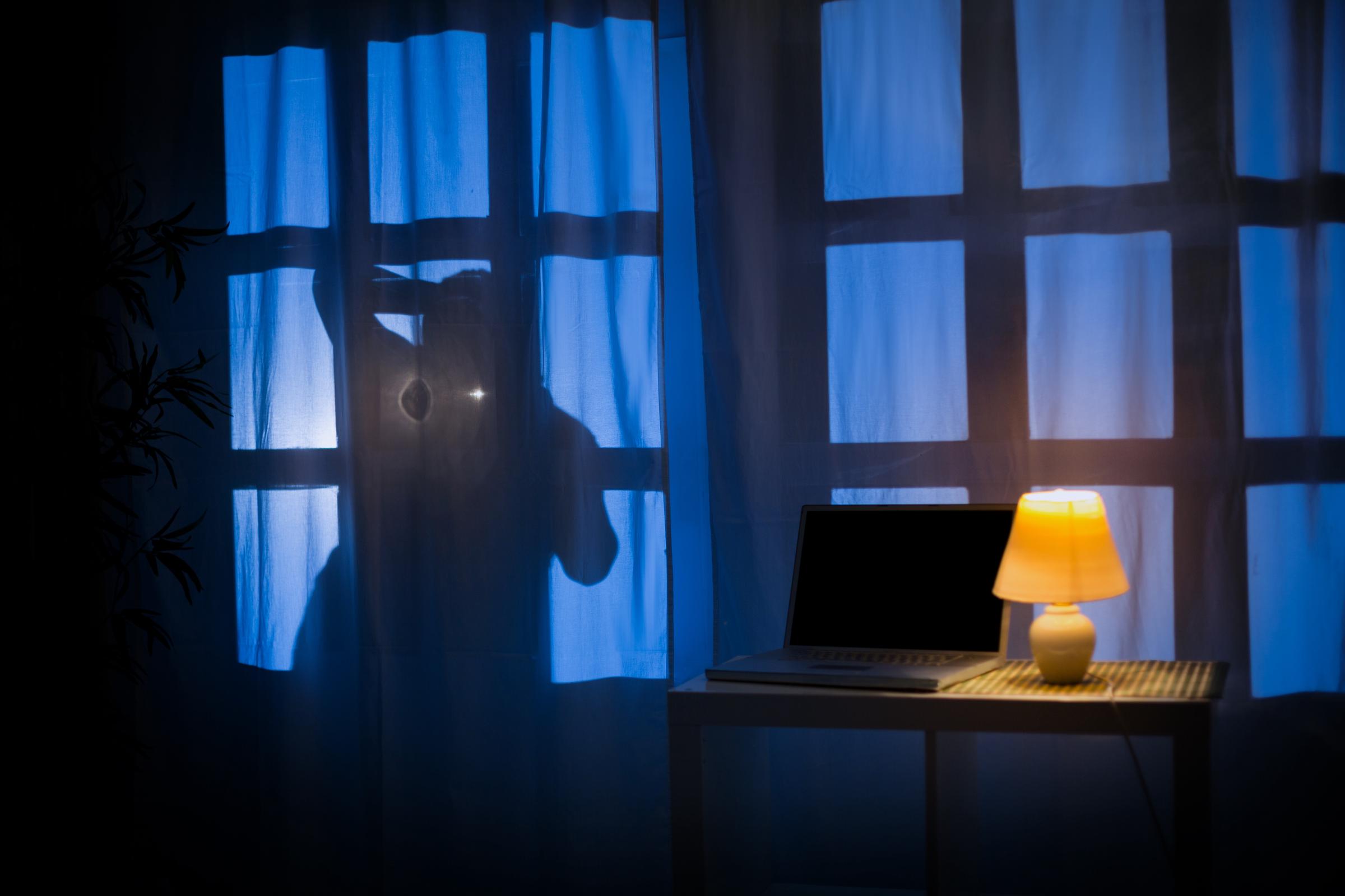 Silhouette of a person at night | Source: Shutterstock