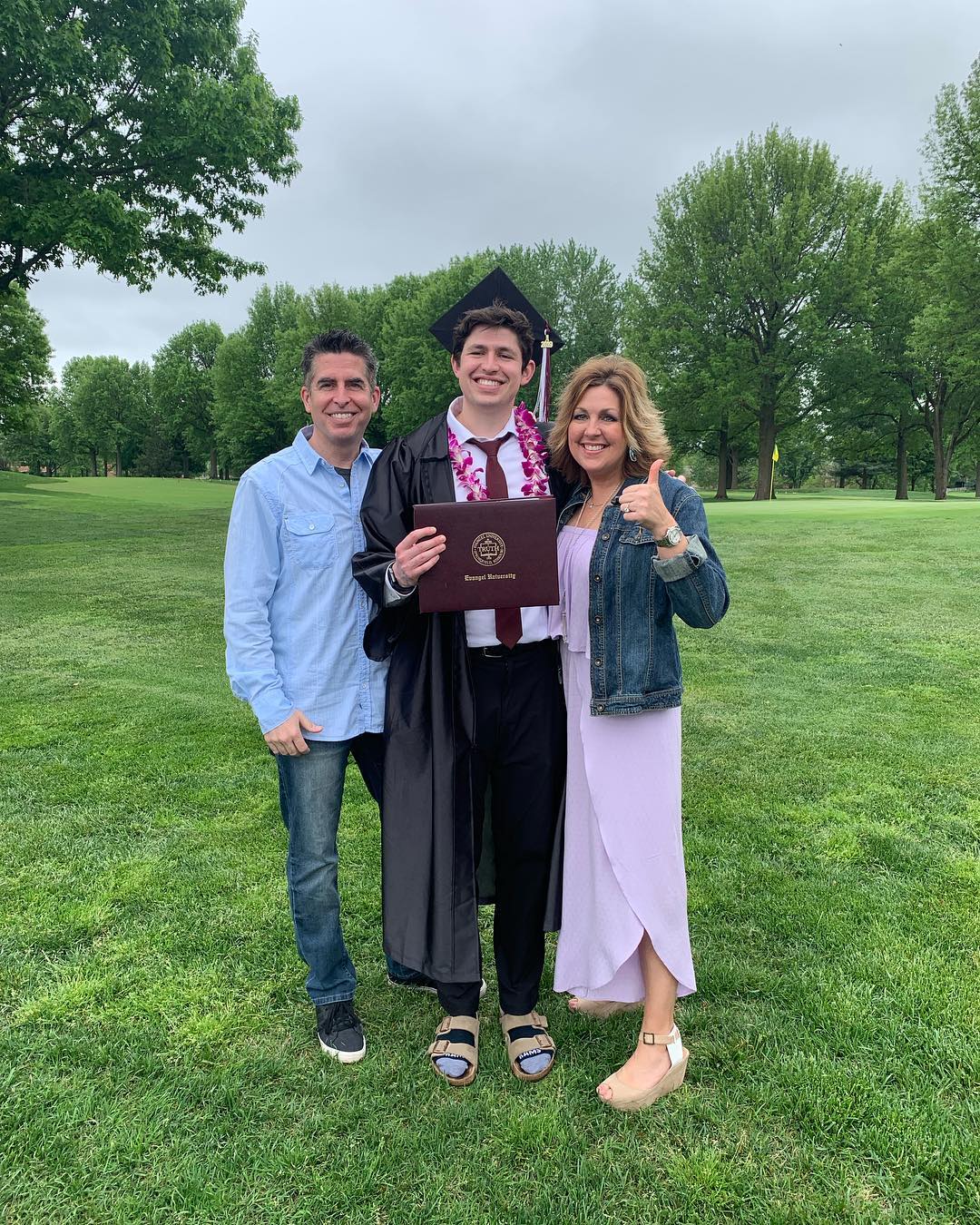 Rob and Julie Neal with their son from a post dated May 4, 2019. | Source: Instagram/julieneal05