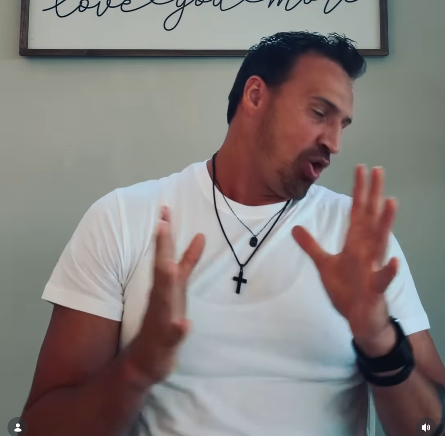 Ryan Lochte turns slightly to the side with both palms raised outward, appearing expressive as he reacts during the video message. | Source: Instagram/ryanlochte