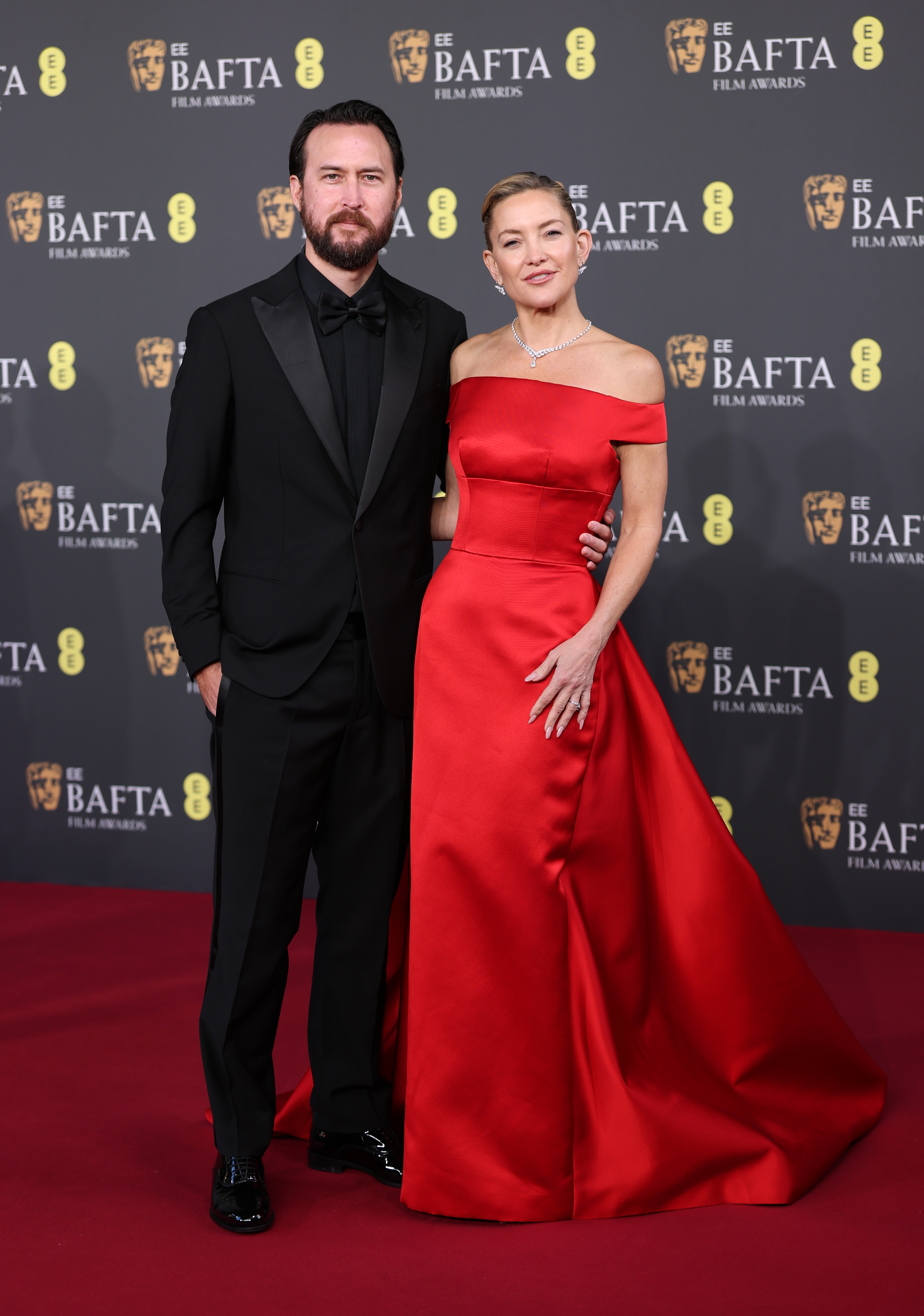 Danny Fujikawa and Kate Hudson attend the 79th BAFTA Film Awards at The Royal Festival Hall on February 22, 2026, in London, England | Source: Getty Images