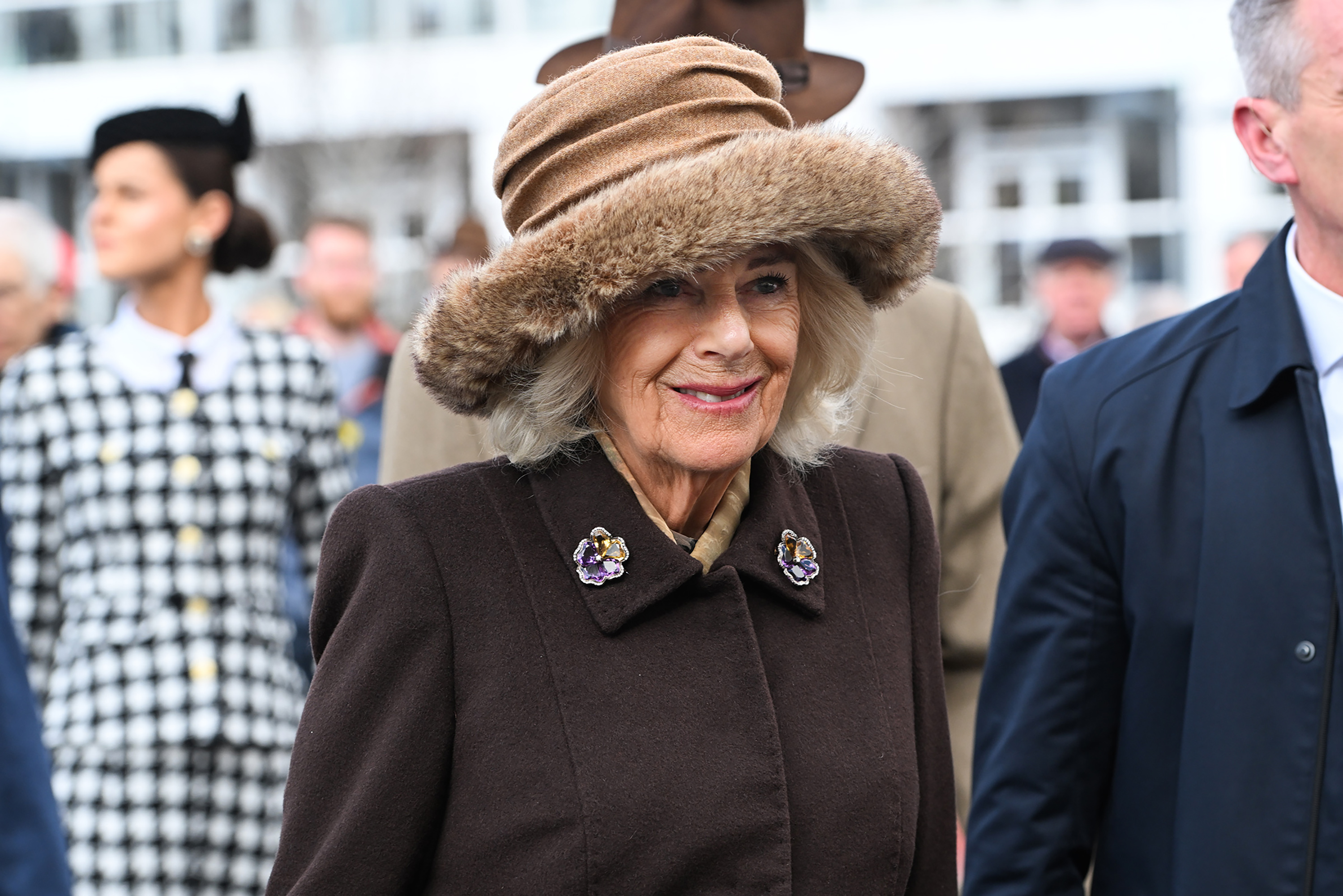 Queen Camilla smiles during her time at The Cheltenham Festival on March 12, 2025, in Cheltenham, England | Source: Getty Images