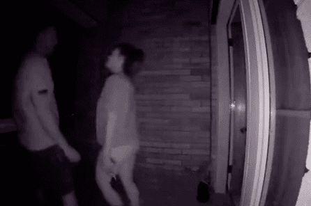 Doorbell camera shows a woman that there are two people on her porch. | Source: TikTok.com/kaylie271