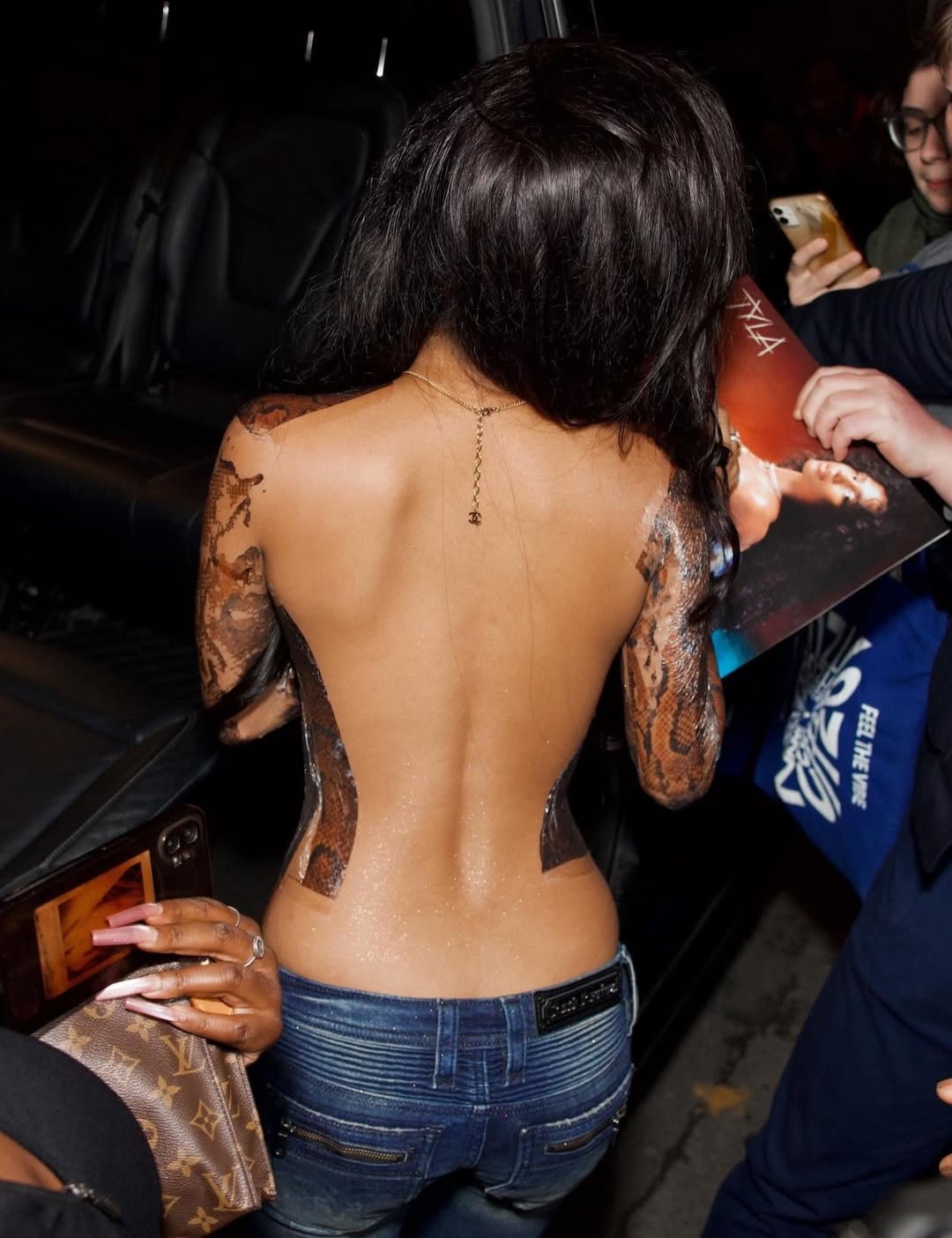 Tyla shows off the back of her illusional top | Source: Instagram/tyla