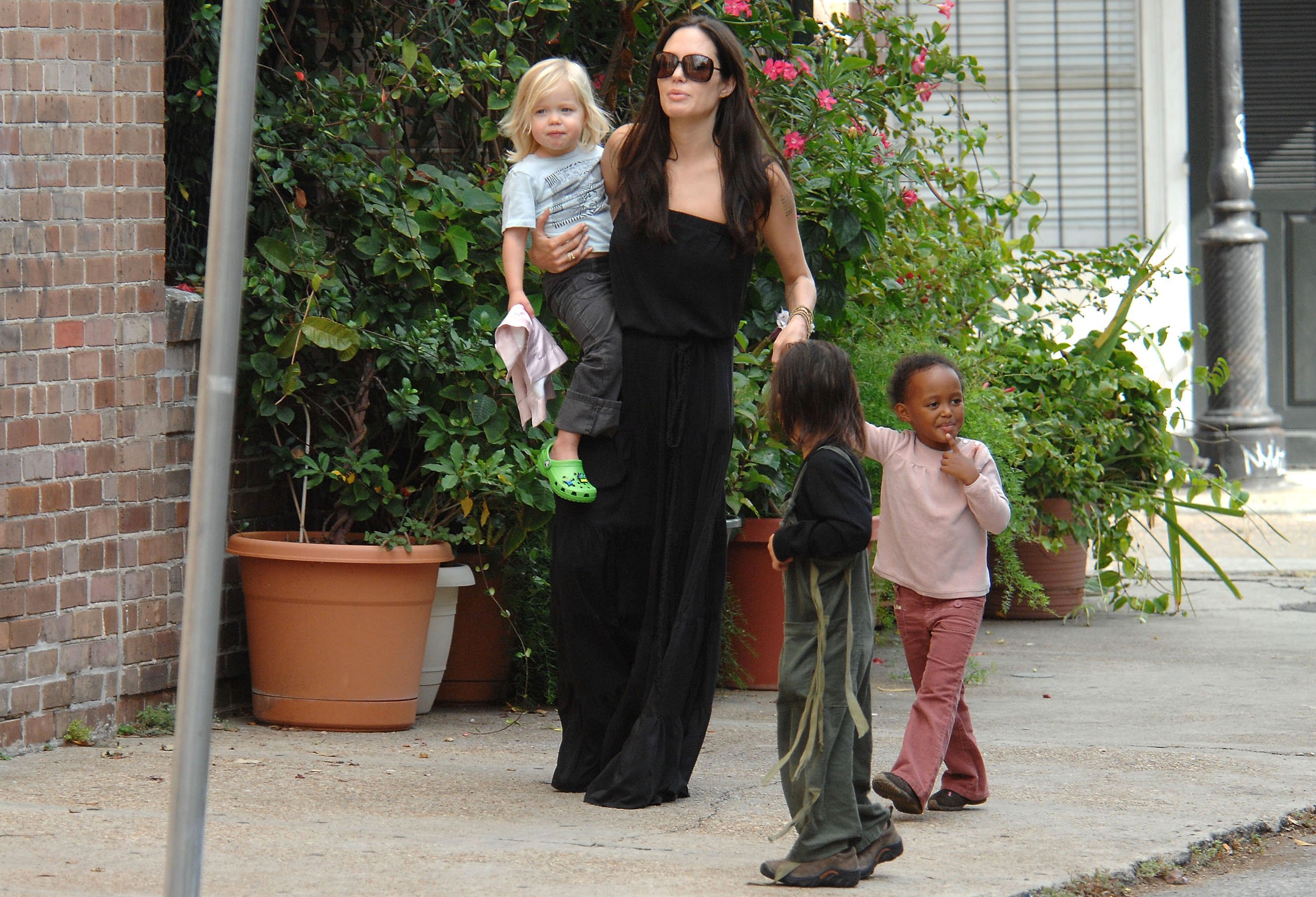 Actress Angelina Jolie and her children Zahara, Pax, and Shiloh are seen walking in the French Quarter on October 6, 2008 in New Orleans, Louisiana | Source: Getty Images