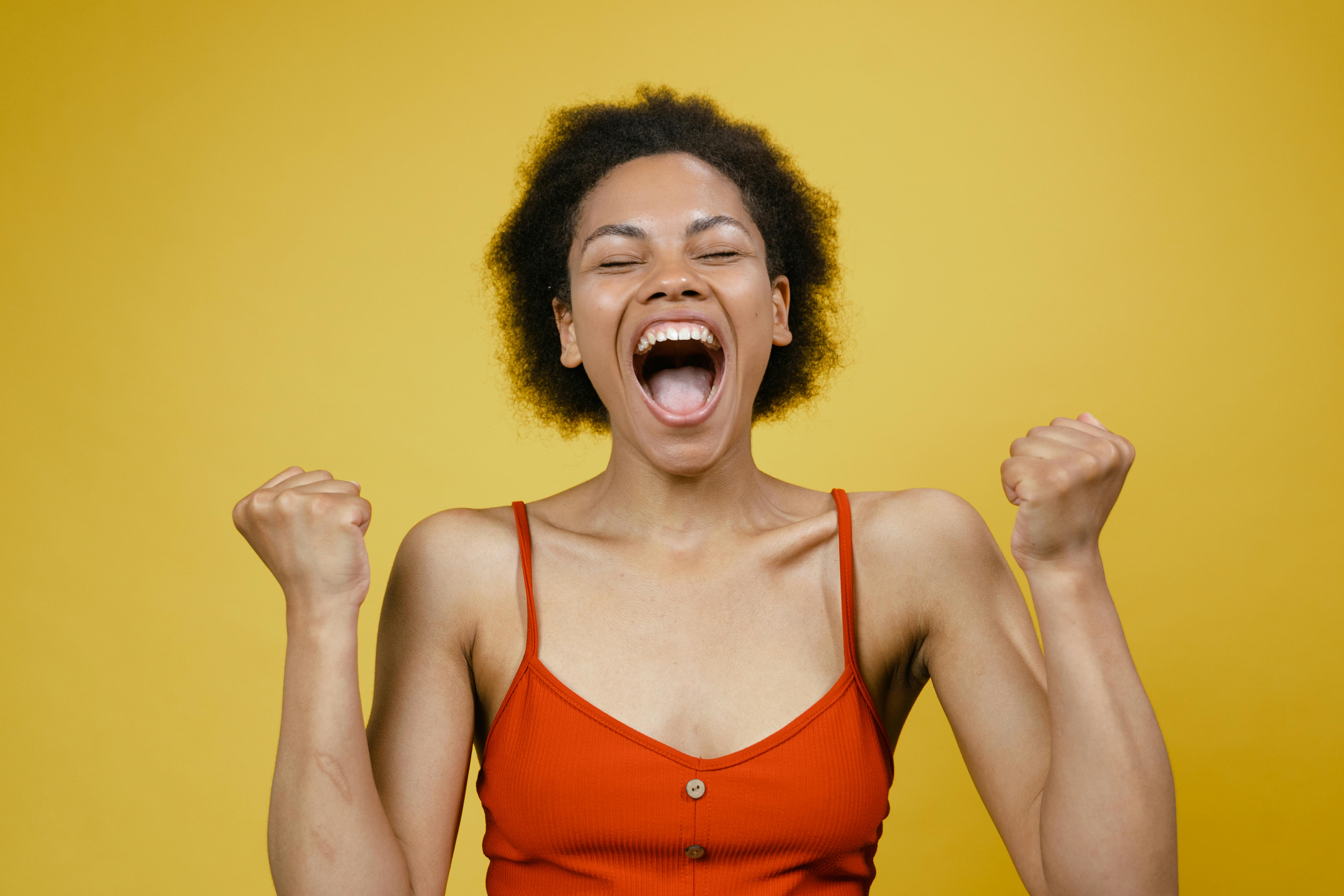 A woman expresses excitement | Source: Pexels