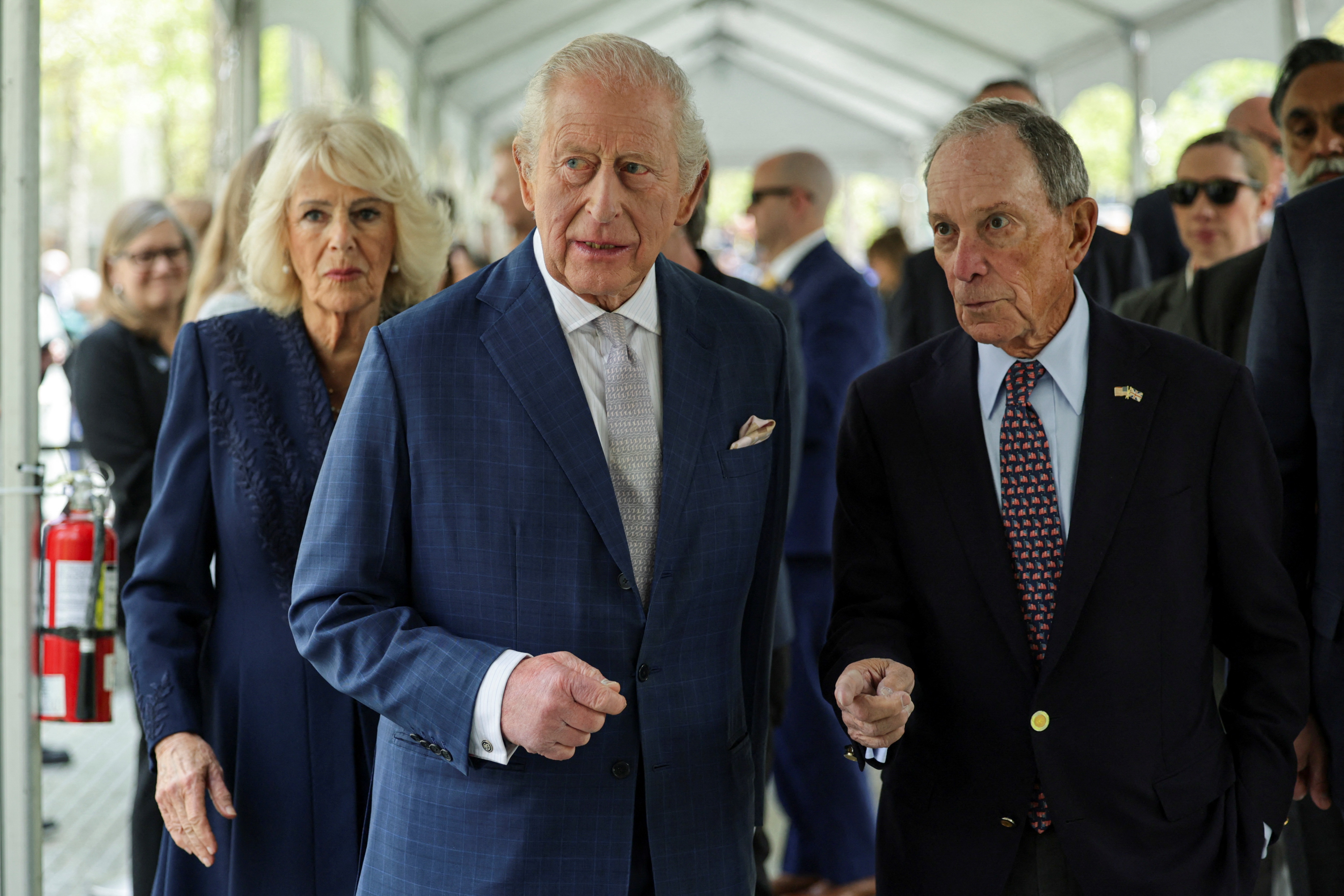 King Charles III speaks with a former New York City mayor as Queen Camilla follows during their visit to the 9/11 Memorial in New York City on April 29, 2026 | Source: Getty Images
