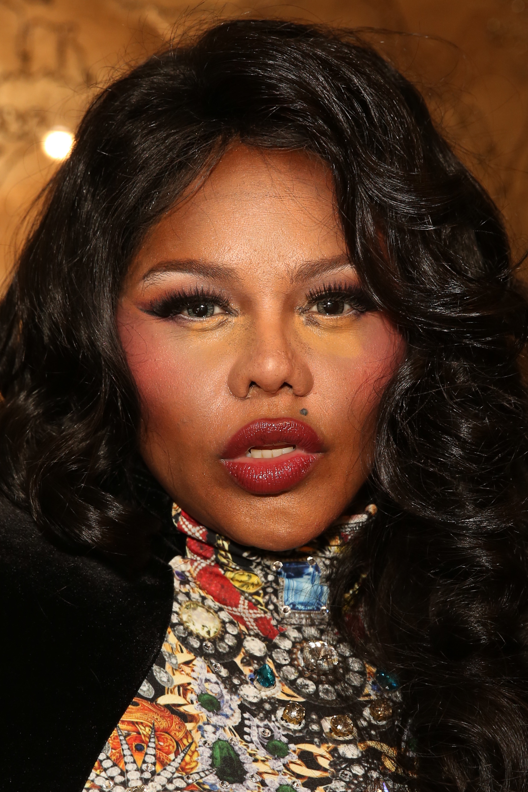 Lil' Kim at The Blonds fashion show during MADE Fashion Week Fall in New York City on February 12, 2014. | Source: Getty Images