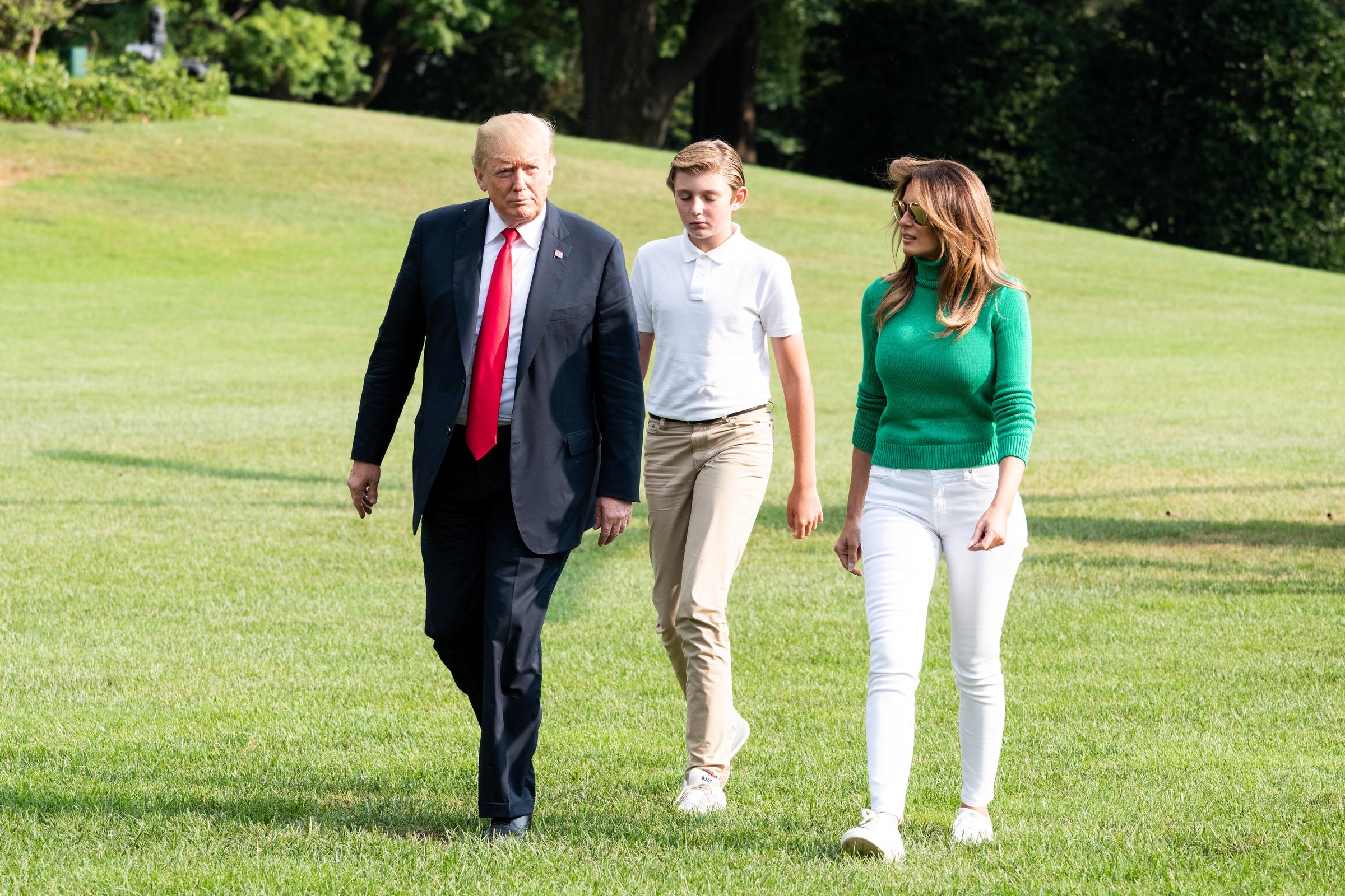 President Donald Trump, First Lady Melania Trump, and Barron Trump returning to the White House in Washington, DC via the Marine One helicopter on August 19, 2018. | Source: Getty Images