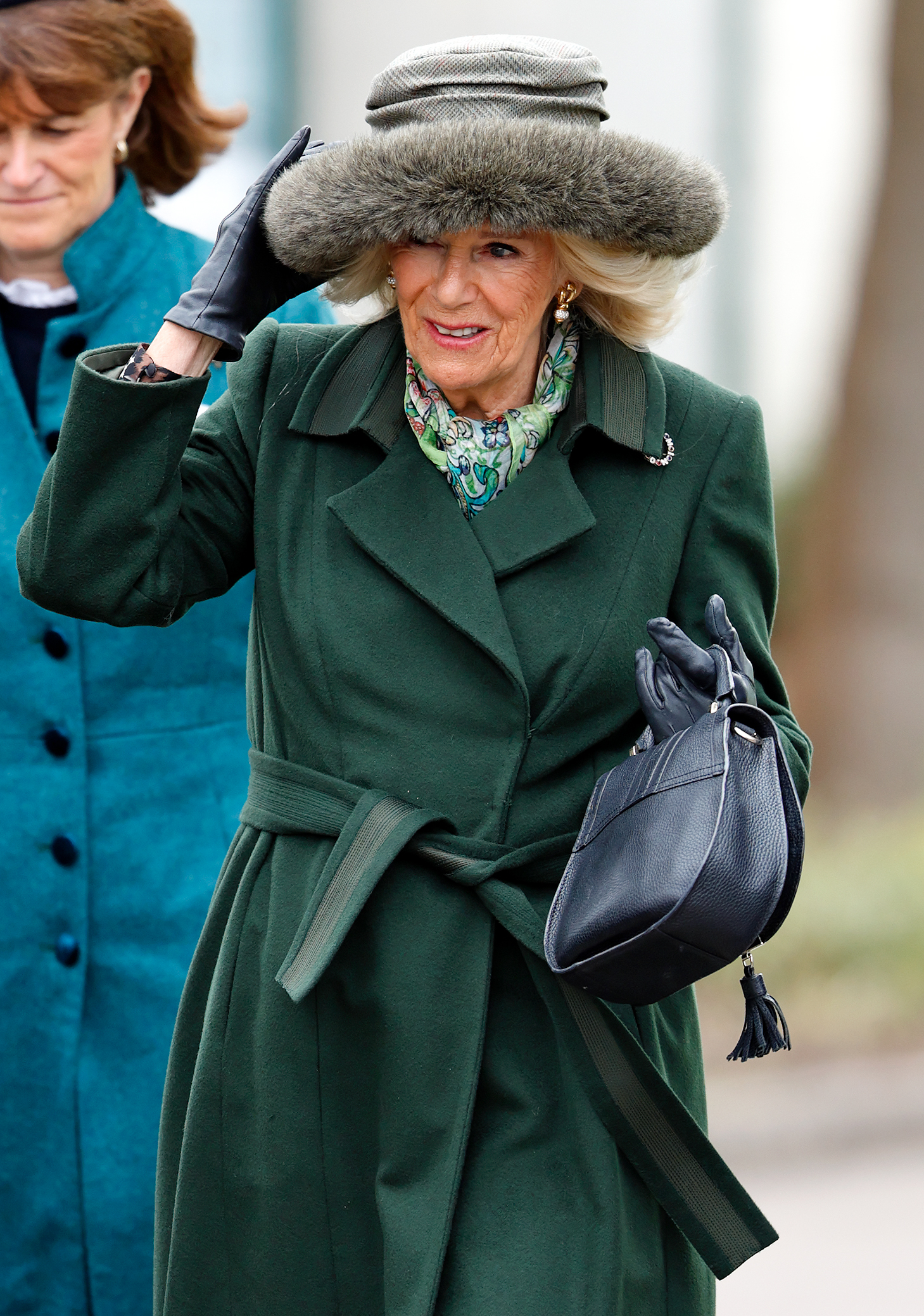 Queen Camilla on day 2 'Style Wednesday' of the Cheltenham Festival at Cheltenham Racecourse on March 13, 2024 in Cheltenham, England | Source: Getty Images