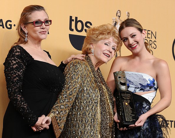 Carrie Fisher, Debbie Reynolds, and Billie Catherine Lourd at The Shrine Auditorium on January 25, 2015 in Los Angeles, California. | Photo: Getty Images