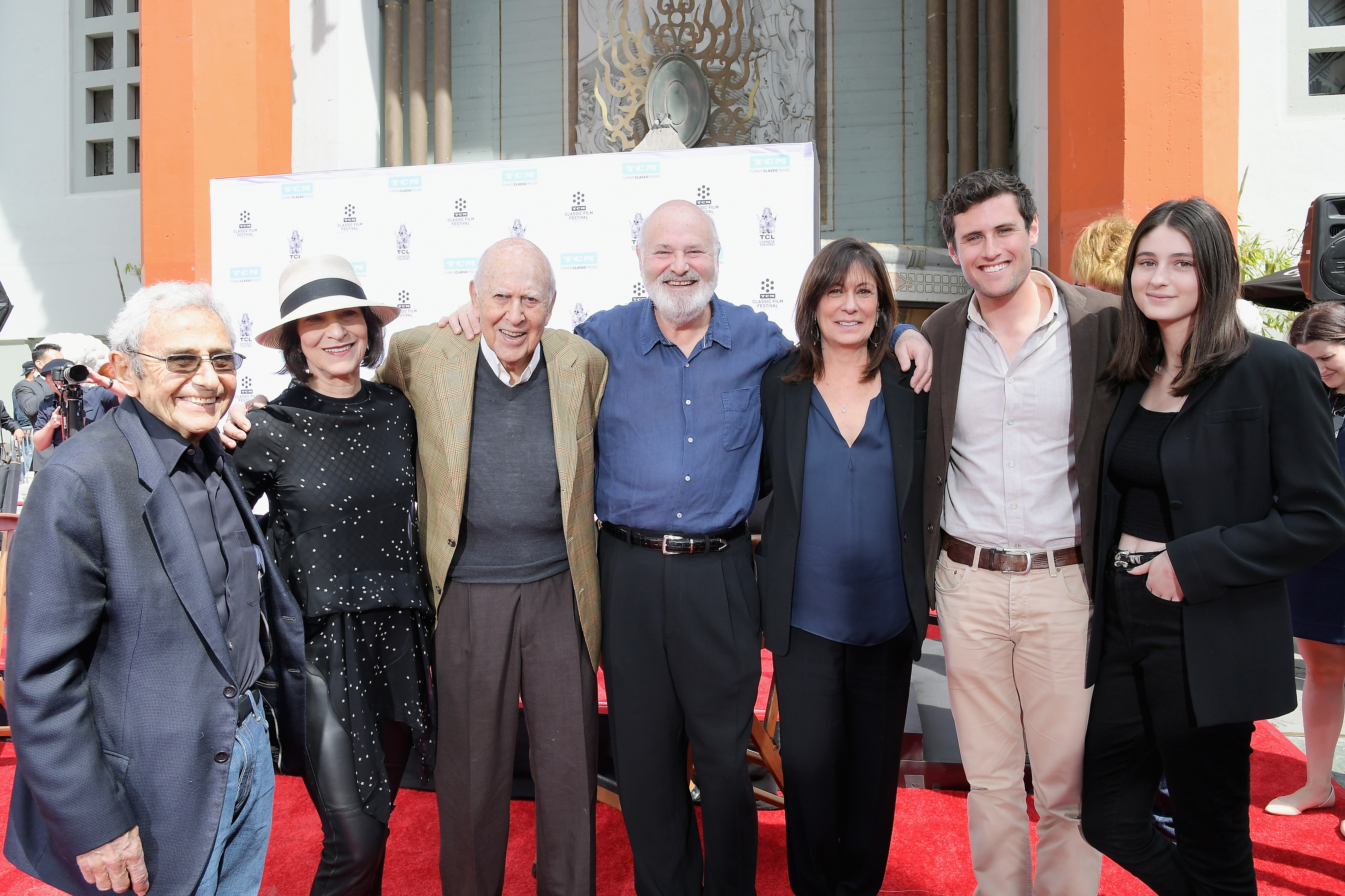 Rob, Michele, Jake, and Romy with Tracy, and Carl Reiner, attend a ceremony during the 2017 TCM Classic Film Festival in Los Angeles on April 7. | Source: Getty Images