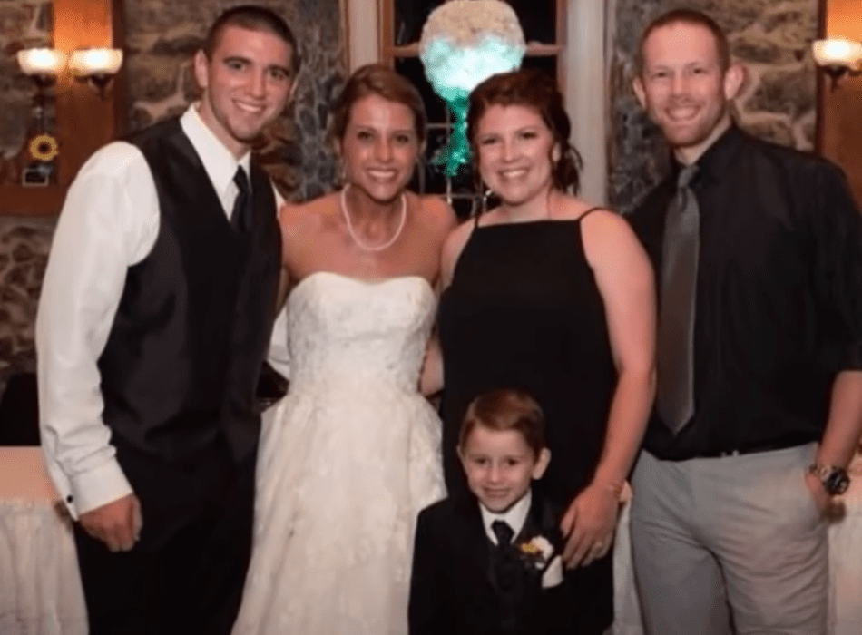 A bride and her groom stand happily with his son and former girlfriend, along with her partner | Source: Youtube/Inside Edition