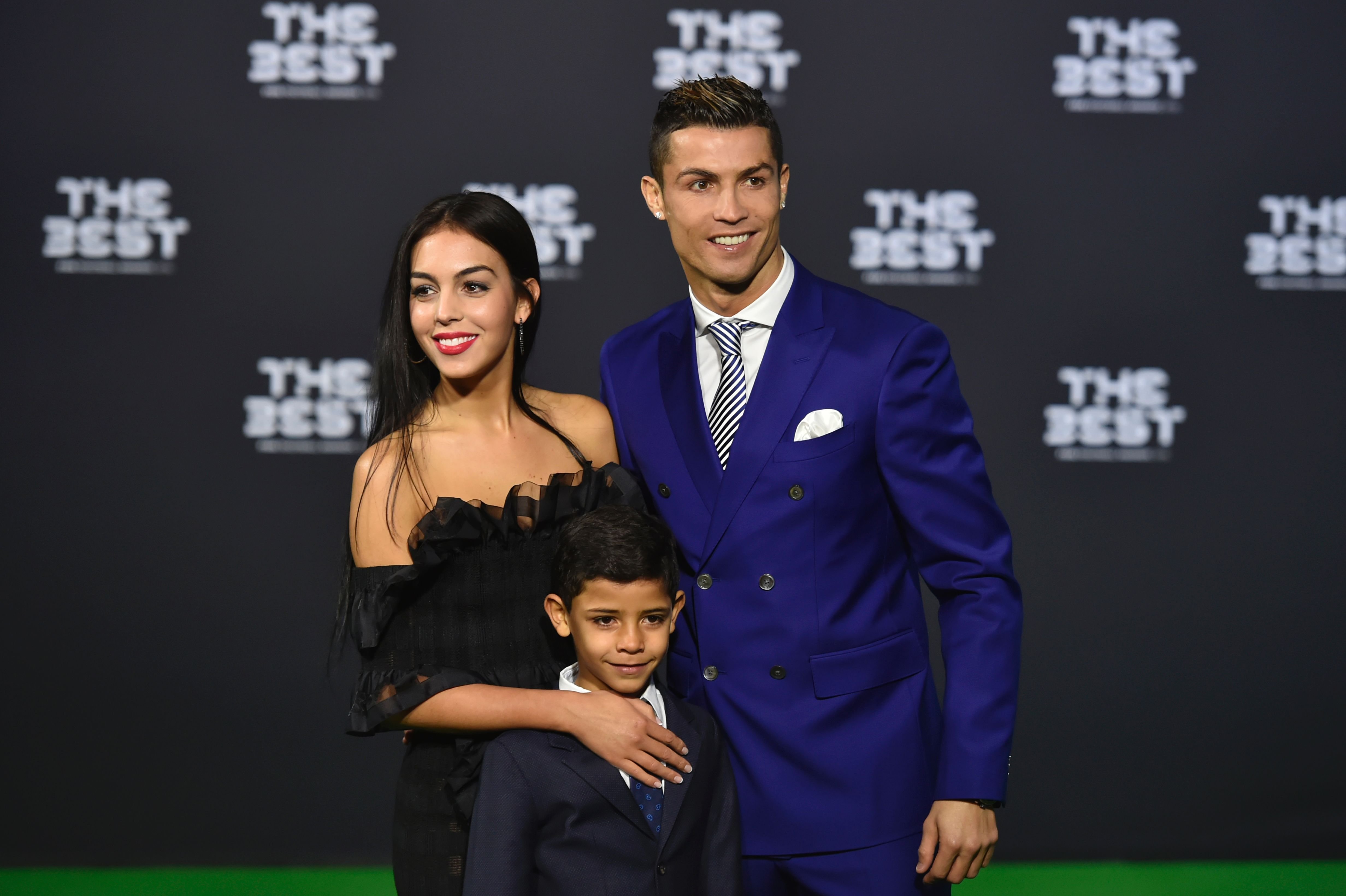 Cristiano Ronaldo poses with partner Georgina Rodriguez and his son Cristiano Ronaldo Jr at The Best FIFA Football Awards 2016 ceremony, on January 9, 2017 in Zurich | Source: Getty Images