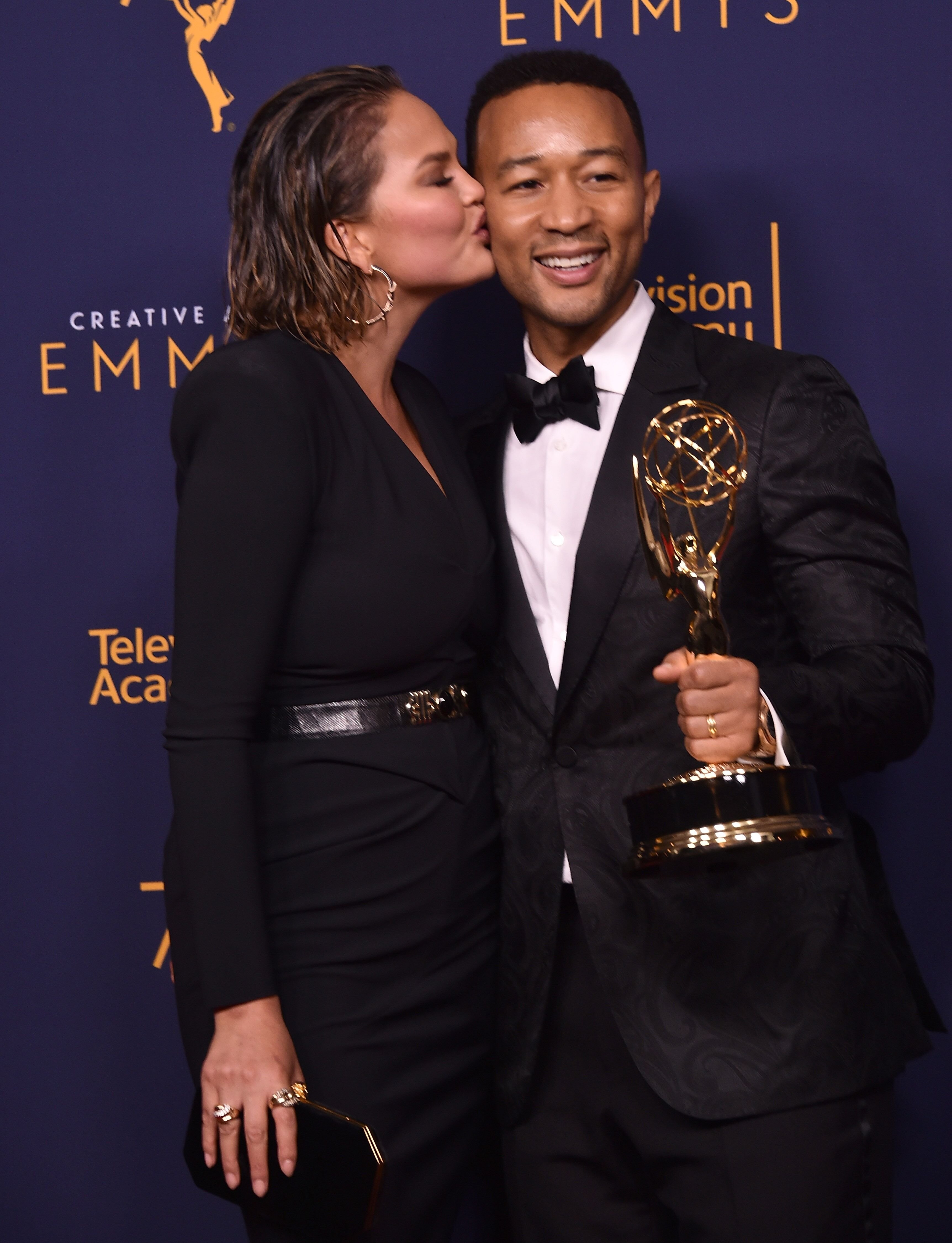 John Legend and Chrissy Teigen at the Emmys/ Source: Getty Images