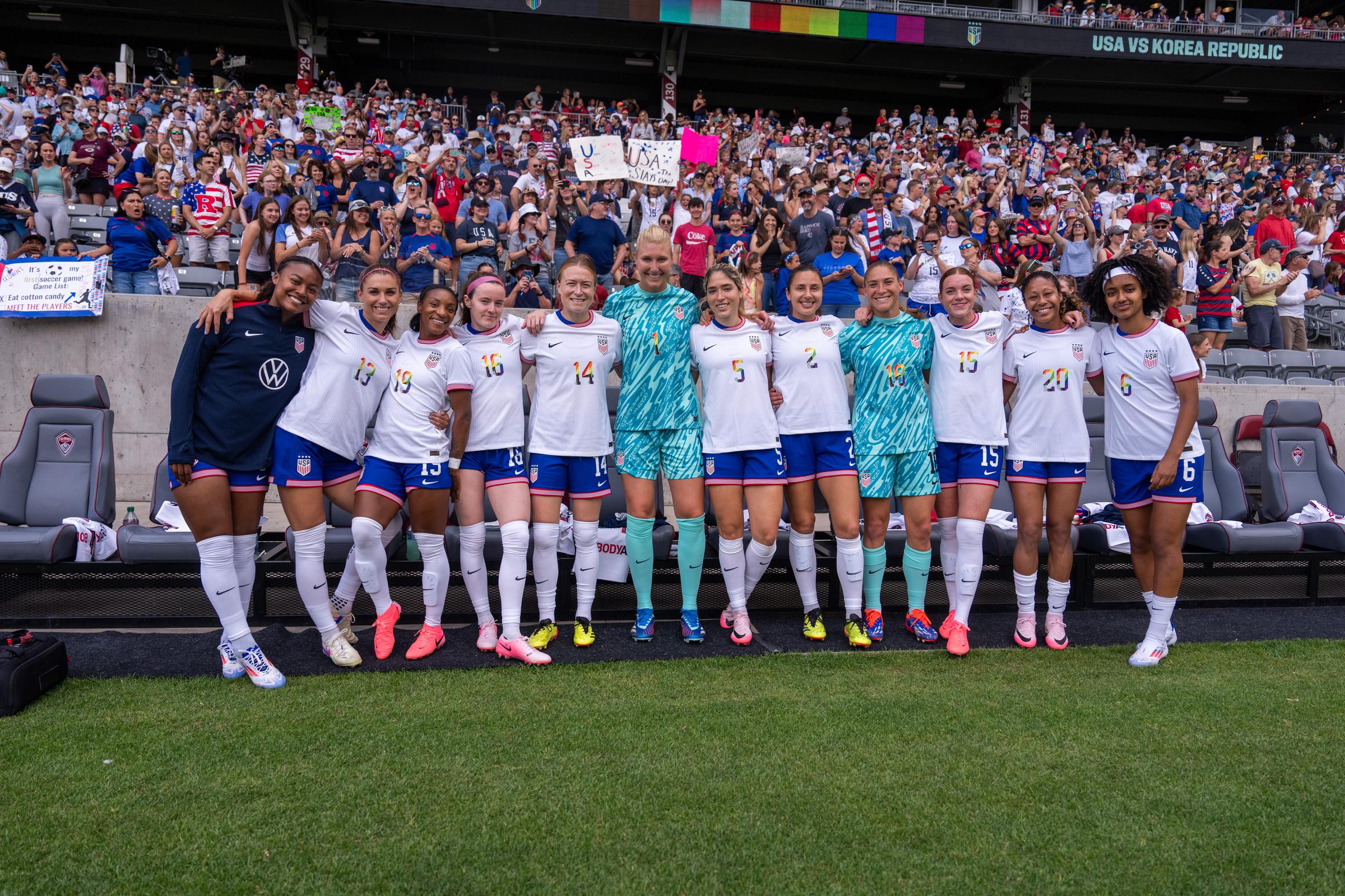 Alex Morgan (Second left) and the rest of USWNT pose for a photo before a game between the Korea Republic and USWNT in Commerce City, Colorado, on June 1, 2024. | Source: Getty Images