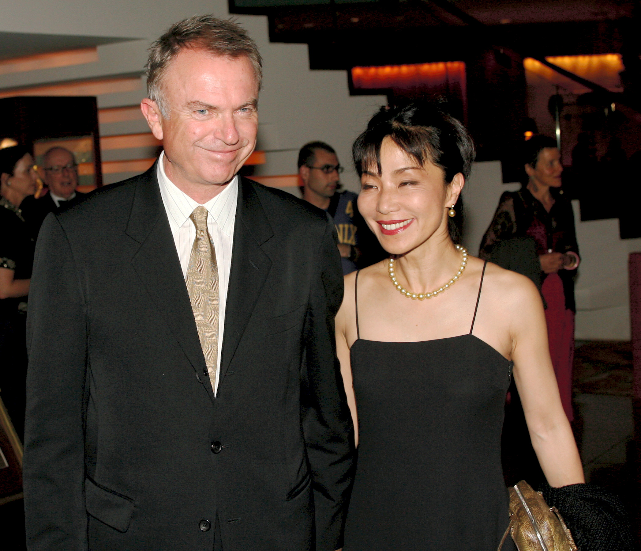 Sam Neill and Noriko Watanabe at the Hollywood Nights fundraising event for the Prince of Wales Hospital at the Four Season Hotel on November 23, 2006, Sydney, Australia. | Source: Getty Images