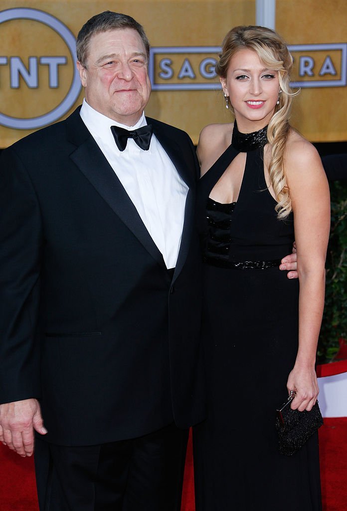  Actor John Goodman (L) and daughter Molly Evangeline Goodman attend the 19th Annual Screen Actors Guild Awards at The Shrine Auditorium. | Photo: Getty Images