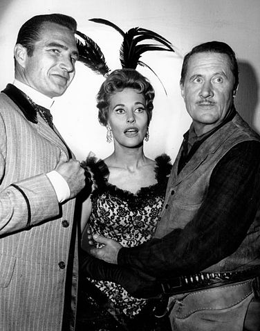 Eric Fleming as Gil Favor and guest stars Lola Albright and Allyn Joslyn from the television program Rawhide in 1964. | Source: Wikimedia Commons.