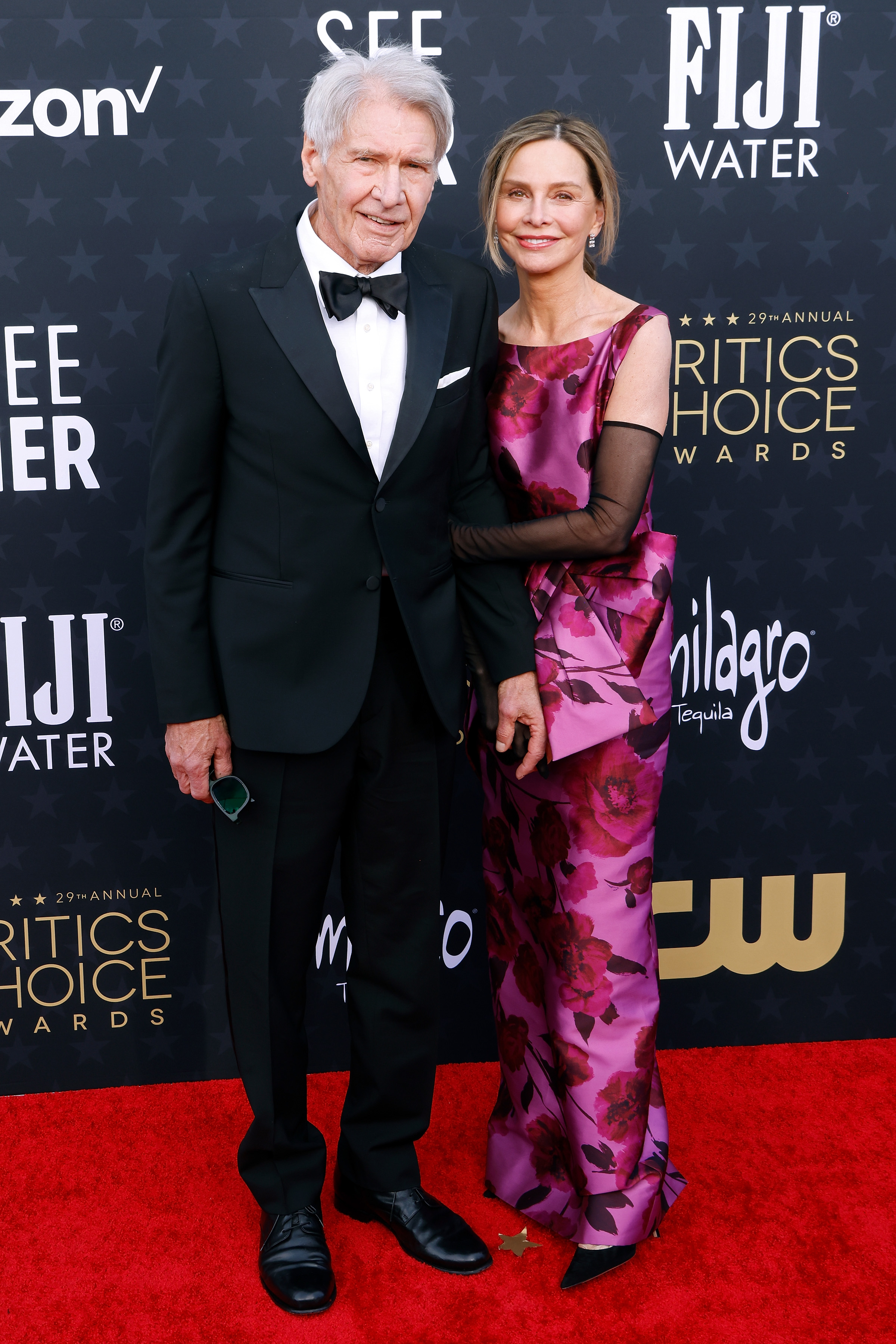 Standing alongside his wife, Calista Flockhart, at the 29th Annual Critics' Choice Awards, Ford cuts an incredibly trim and athletic silhouette. His broad shoulders and remarkably lean frame show that his decades of dedicated strength training continue to pay off, keeping him in great shape well into his 80s. | Source: Getty Images
