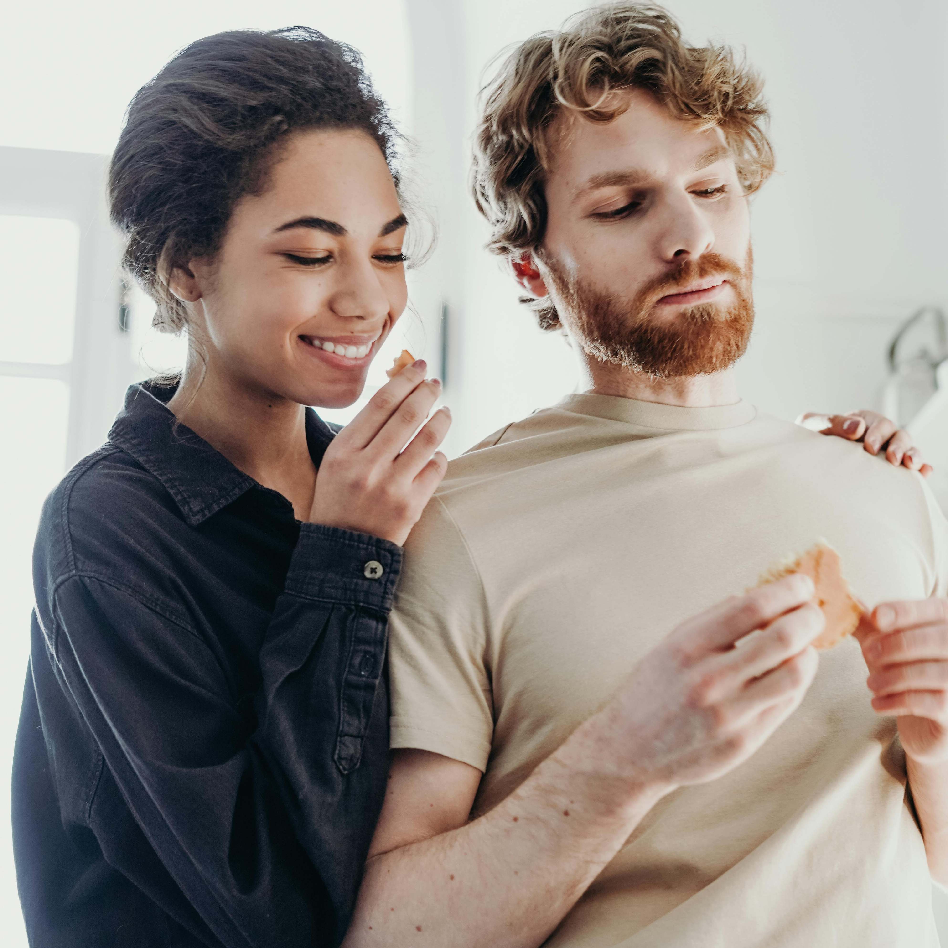 A couple finishing up a meal together | Source: Pexels