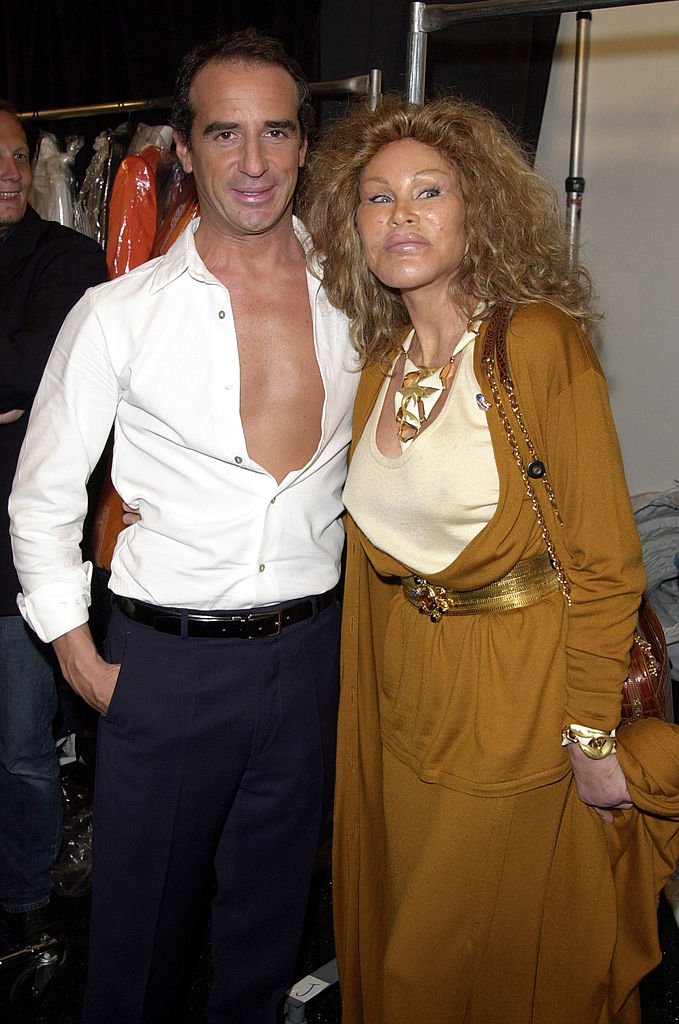 Lloyd Klein and Jocelyne Wildenstein during Mercedes-Benz Fashion Week Spring 2004 - Lloyd Klein - Front Row and Backstage at Josephine Tent, Bryant Park in New York City, New York, United States. | Source: Getty Images