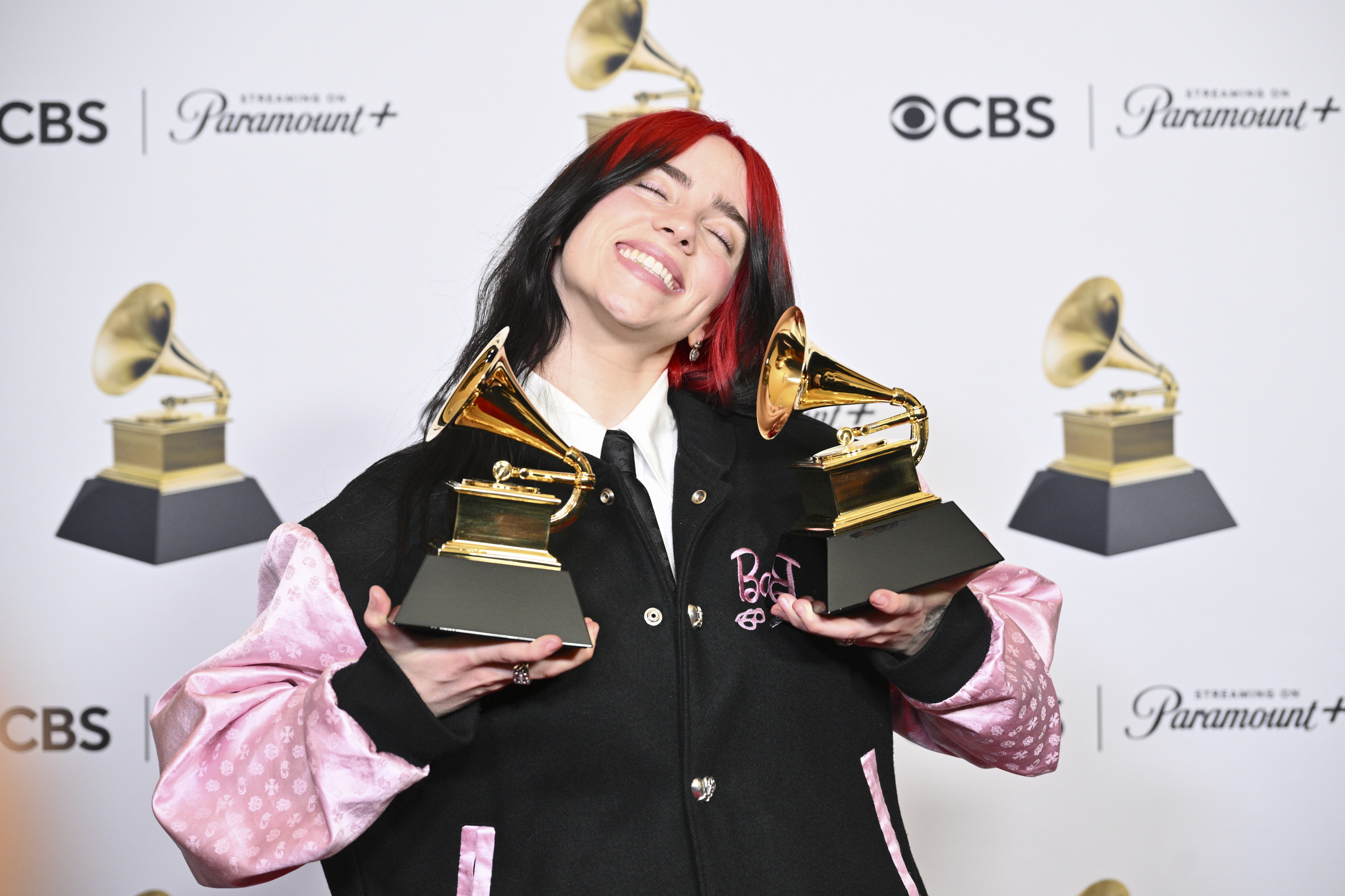 Billie Eilish posing with her Grammy awards at the 66th Annual Grammy Awards in Los Angeles, California on February 4, 2024. | Source: Getty Images