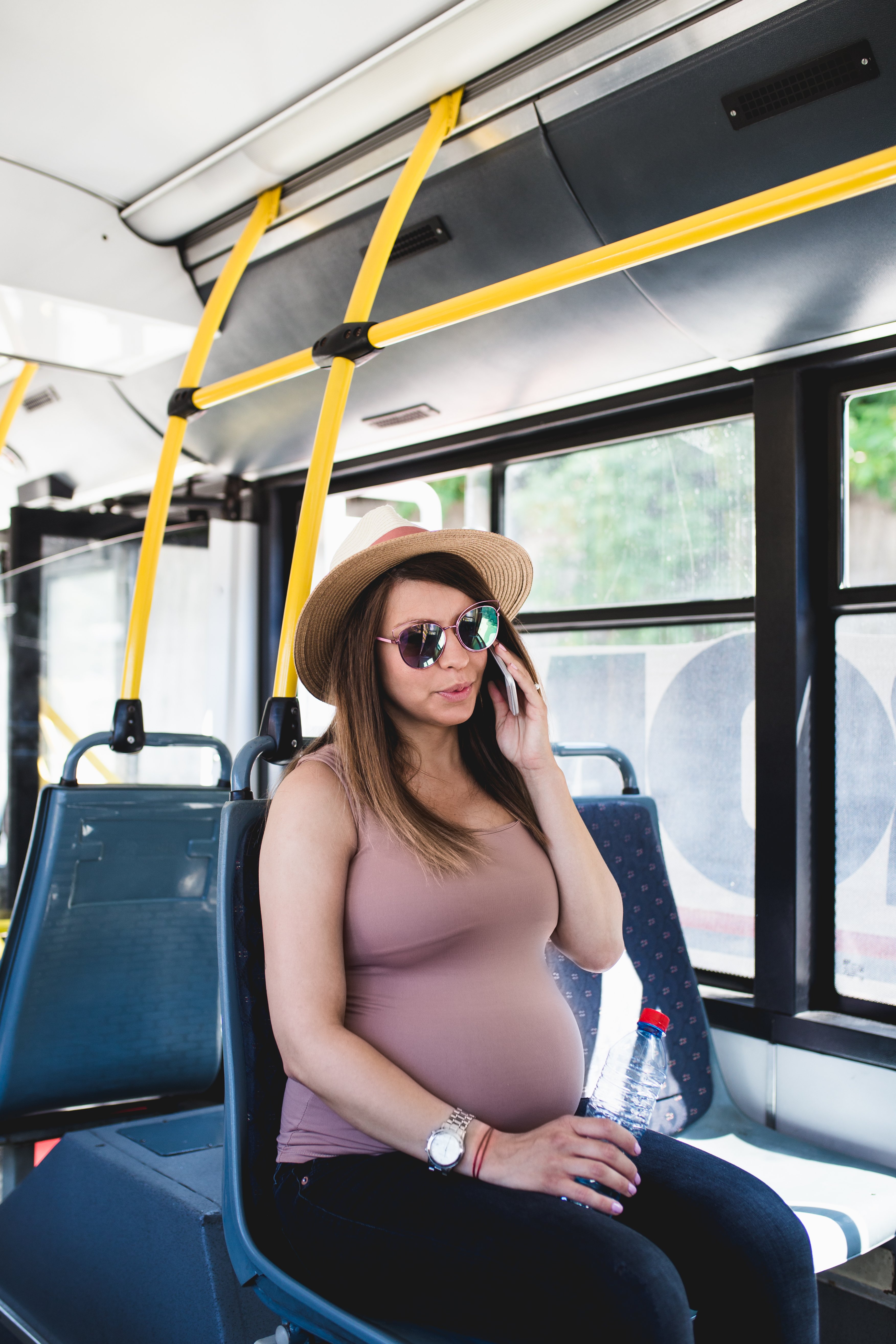 Pregnant woman on a bus | Source: Shutterstock