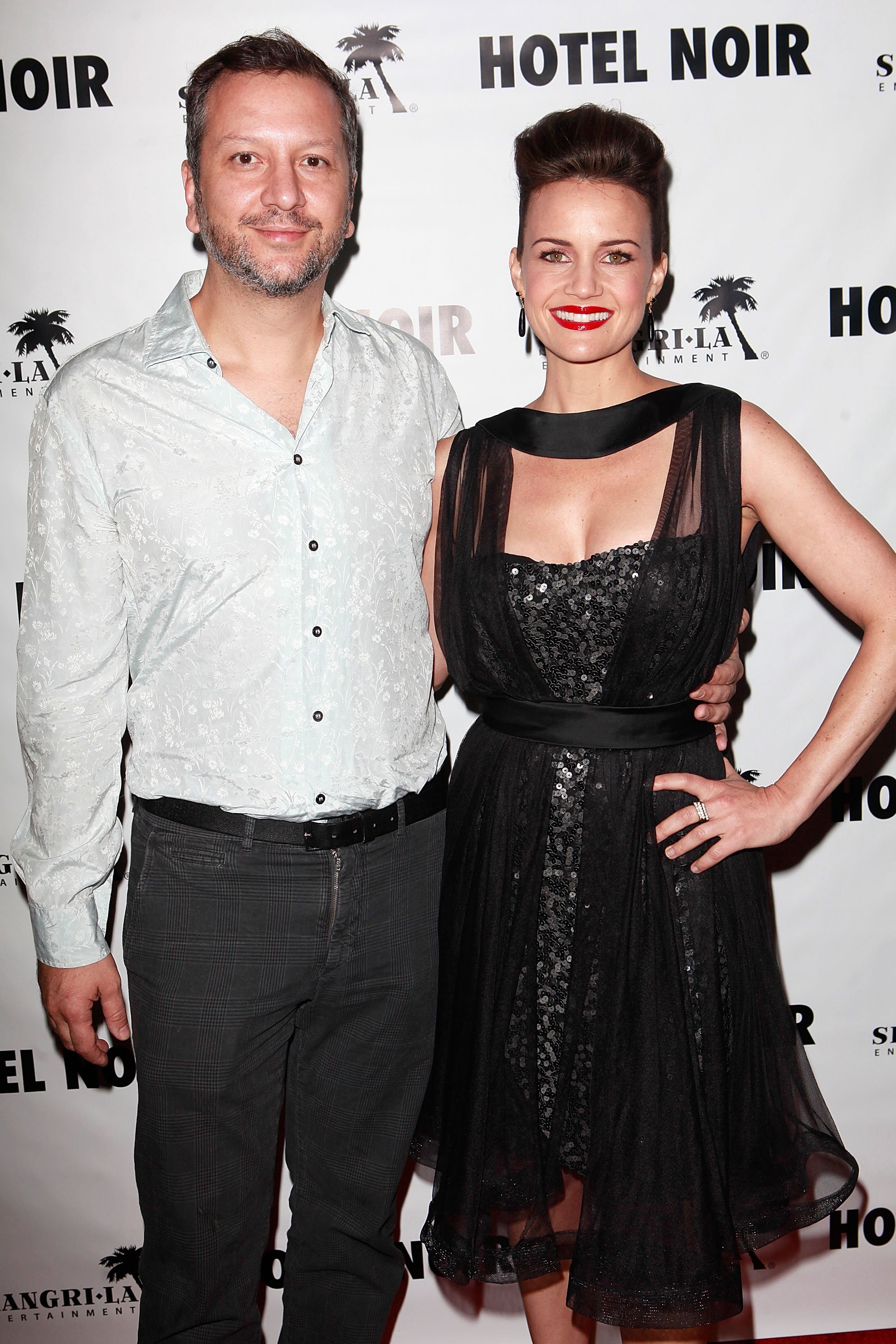 Sebastian Gutierrez and Carla Gugino attend the screening of "Hotel Noir" at Soho House on September 27, 2012, in West Hollywood, California. | Source: Getty Images