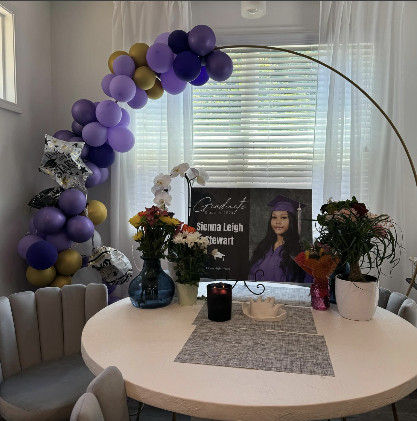 A lovely setup to celebrate Sienna Stewart's graduation and her incredible life, as seen in a post dated June 16, 2024 | Source: Facebook/lilkim.pov