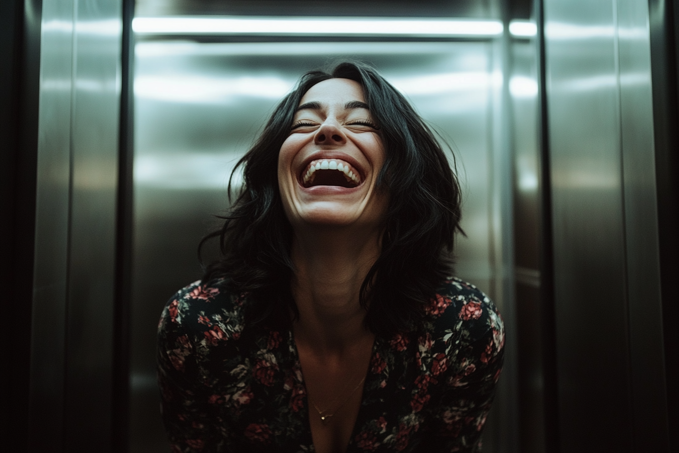 A woman laughing in an elevator | Source: Midjourney