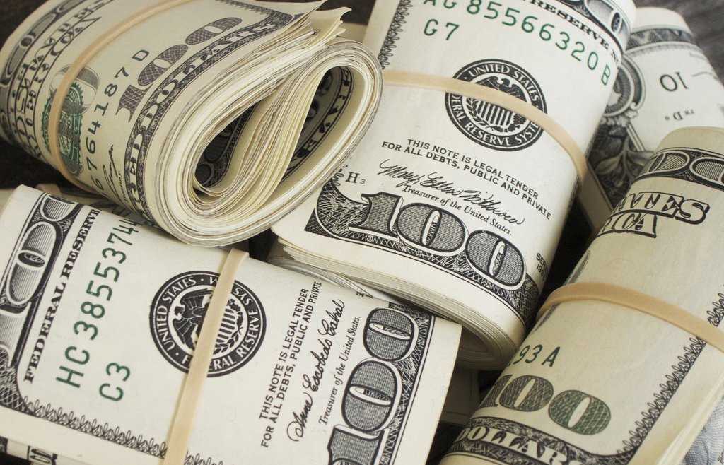 $100 bills | Source: Flickr