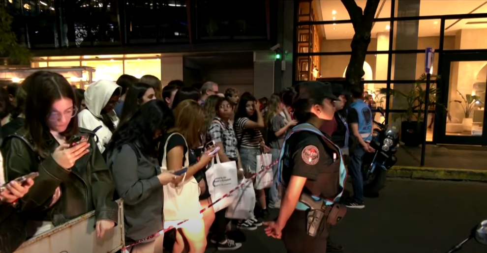 Fans gathered outside CasaSur Palermo Hotel, dated October 16, 2024 | Source: Youtube/Reuters