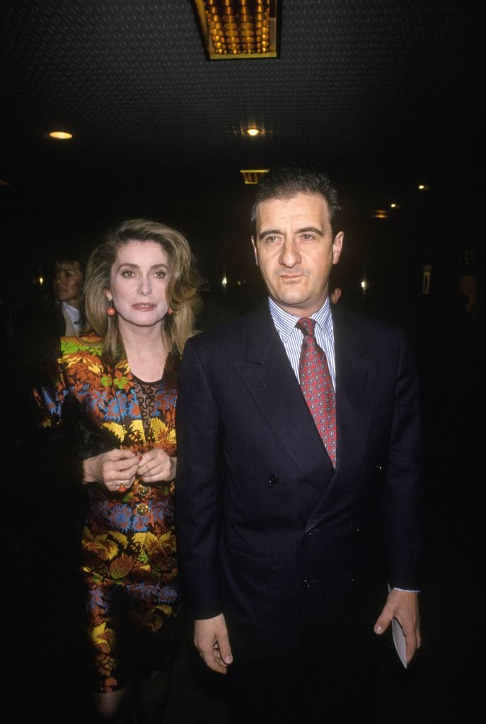 Pierre Lescure et Catherine Deneuve | Photo : Getty Images