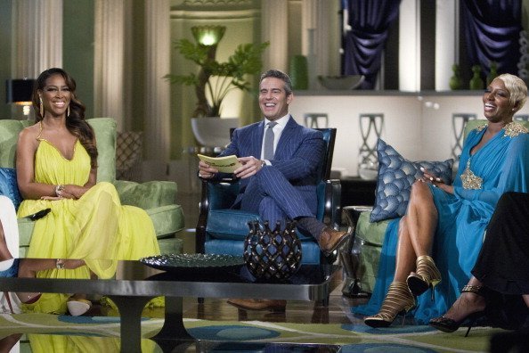 Kenya Moore, Andy Cohen and  NeNe Leakes on set of THE REAL HOUSEWIVES OF ATLANTA | Photo: Getty Images