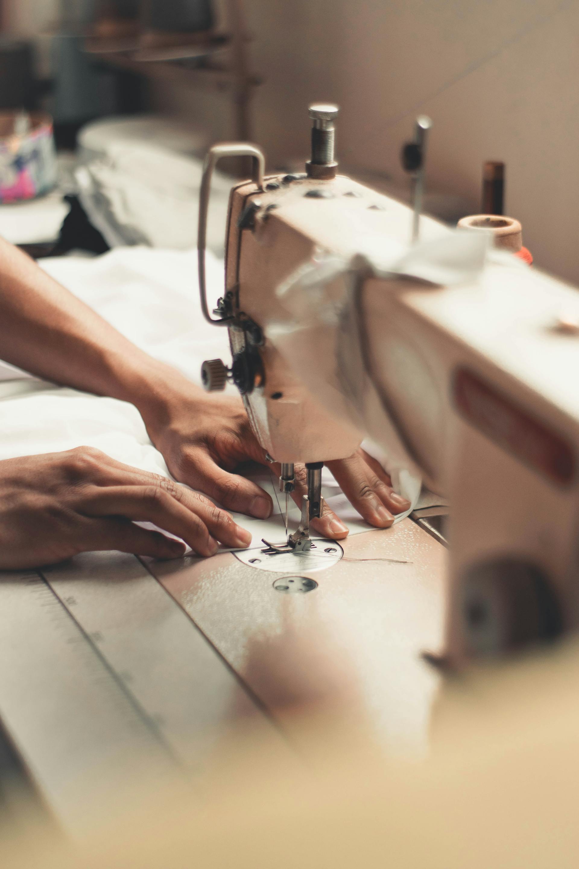 A person using a sewing machine | Source: Pexels