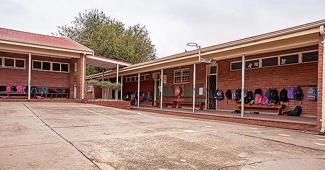 School buildings with school bags outside.  | Source: Shutterstock