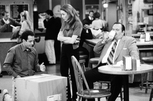 Tony Shalhoub as Antonio Scarpacci, Amy Yasbeck  and David Schramm on set of "WINGS " | Photo: Getty Images